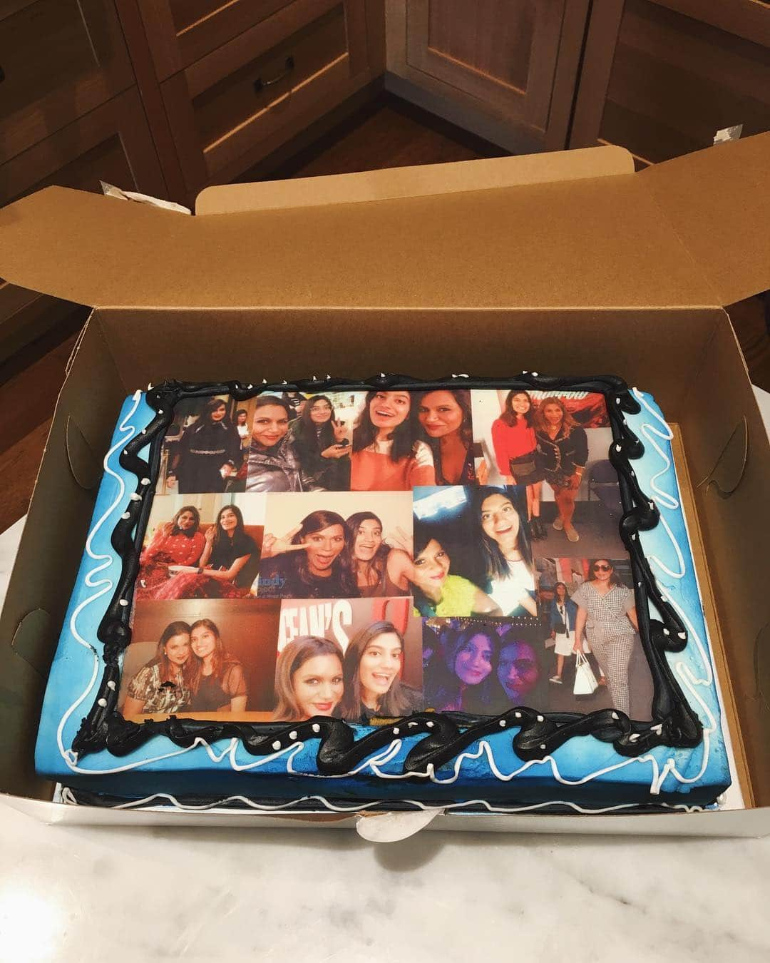 ミンディ・カリングさんのインスタグラム写真 - (ミンディ・カリングInstagram)「@Asekar95 got me this cake covered in photos of us because on Monday she starts as a staff writer on my new show! 👏🏾🙌🏾 I’m so proud to send this girl off into the writer’s room. From the day we first met at my book signing, to traveling the world together, we have the best memories. I’m going to miss her funny, hardworking self as an assistant, but I’m so happy to see her as one of my funny hardworking writers! One of the best parts of my job is seeing young women grow and succeed. Yay Akshara! 🎂💙」3月31日 10時50分 - mindykaling