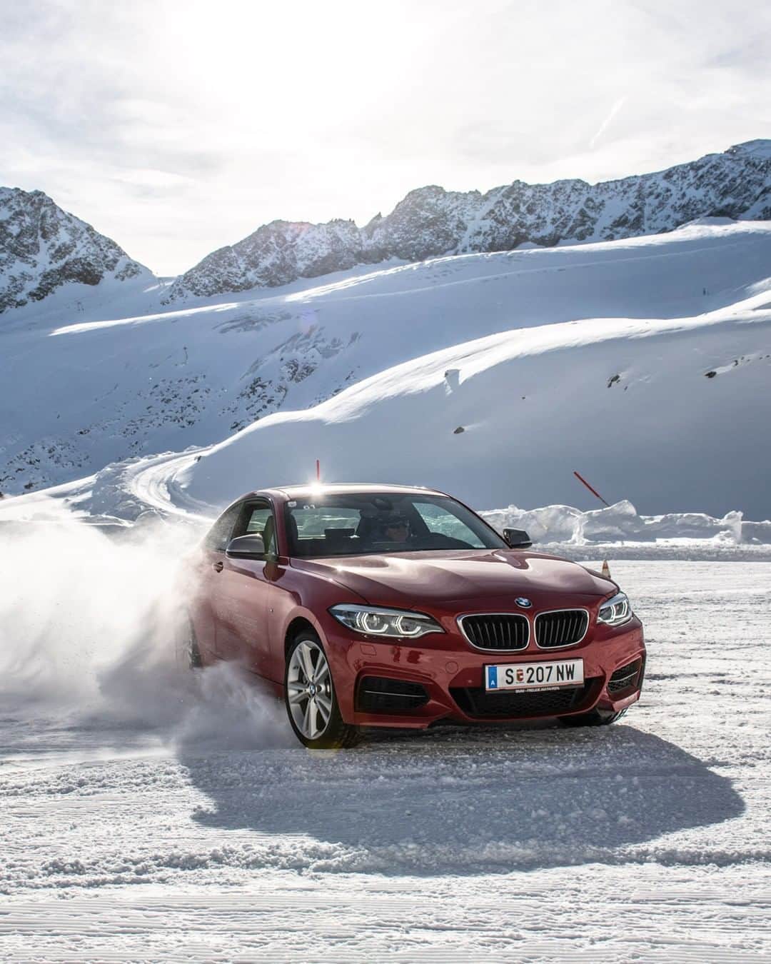 BMWのインスタグラム：「Drifting in pleasure. The BMW M240i Coupé. #BMWrepost @michaelwerlberger #BMW #M240i #Soelden @BMWDrivingExperience __ BMW M240i Coupé: Fuel consumption in l/100 km (combined): 7.4 - 7.3. CO2 emissions in g/km (combined): 168 - 167. The values of fuel consumptions, CO2 emissions and energy consumptions shown were determined according to the European Regulation (EC) 715/2007 in the version applicable at the time of type approval. The figures refer to a vehicle with basic configuration in Germany and the range shown considers optional equipment and the different size of wheels and tires available on the selected model. The values of the vehicles are already based on the new WLTP regulation and are translated back into NEDC-equivalent values in order to ensure the comparison between the vehicles. [With respect to these vehicles, for vehicle related taxes or other duties based (at least inter alia) on CO2-emissions the CO2 values may differ to the values stated here.] The CO2 efficiency specifications are determined according to Directive 1999/94/EC and the European Regulation in its current version applicable. The values shown are based on the fuel consumption, CO2 values and energy consumptions according to the NEDC cycle for the classification. For further information about the official fuel consumption and the specific CO2 emission of new passenger cars can be taken out of the „handbook of fuel consumption, the CO2 emission and power consumption of new passenger cars“, which is available at all selling points and at https://www.dat.de/angebote/verlagsprodukte/leitfaden-kraftstoffverbrauch.html.」