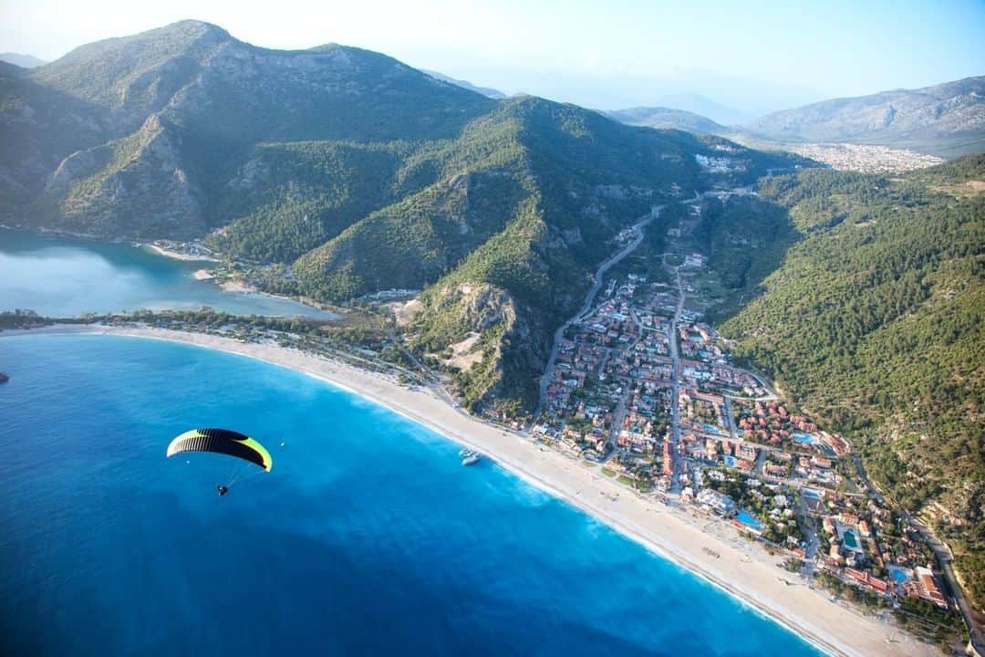 National Geographic Travelさんのインスタグラム写真 - (National Geographic TravelInstagram)「Photo by @jodymacdonaldphoto | Home to one of the highest commercial take-off paragliding sites in the world makes flying over Oludeniz beach in Turkey a popular paragliding destination. Being able to land on one of Turkey’s most beautiful beaches, walk 30 ft and grab a beer isn’t too bad either. #Followme @jodymacdonaldphoto to see more images from my adventures around the world. #turkey #paragliding #oludeniz」4月1日 6時58分 - natgeotravel