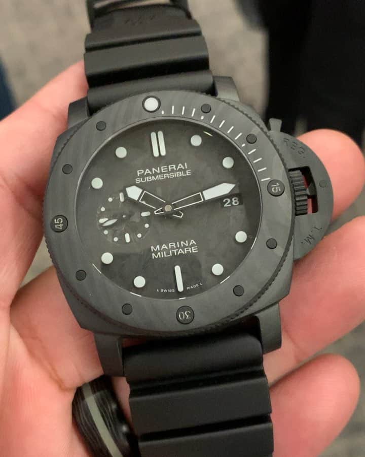 パネライのインスタグラム：「The other member of the new 47mm Submersible Marina Miltare line is this #Panerai #PAM979. I like to call this one the stealth edition because it features the matte black Carbotech material for the case, Forged Carbon Dial, and paired with a nice grey lume. The Lume is the same type that we see in the other version as well as the new Carbotech models which is the solid 3D block lume indexes. . #PaneraiSIHH2019 #PaneraiCentral .」
