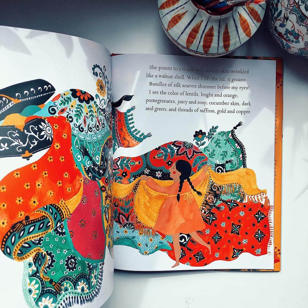 Dinara Mirtalipovaのインスタグラム：「Just wanted to give you a glimpse preview of some of my favorite spreads from “Leila in Saffron” book. You might know about my long love for textiles and patterns, so when working on this book I really wanted to bring in this obsession of mine into this story. The character Leila reminds me a lot of my daughter Sabrina, they are both about the same age, they both rock this two-braid hairstyle, and they both love playing with grandma’s scarfs. On top of everything, both my daughter and the character Leila live between two cultures - the American society and the traditional culture of where their family came from. So when I first read the script i felt like I knew the character so well.  #leilainsaffron #simonandschuster」
