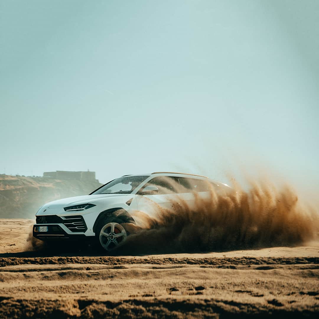 ランボルギーニのインスタグラム：「Unique style and perfect design surrounded by natural beauty. Along the Portuguese coast with Lamborghini Urus. Photo by @alenpalander.  #Lamborghini #Urus #SinceWeMadeItPossible #Portugal #LightsOnLamborghini」