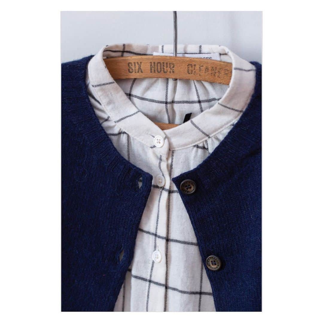 キャベジズ&ローゼズのインスタグラム：「Our Sapphire Blouse in Brushed Check Japanese Cotton has a simple collar that shines in its elegance 💙 Made from the softest fabric, this is one shirt you will never want to take off #checks #chequeredshirt #japanesecotton #madeinengland🇬🇧 #springfashion #ss19collection #details✨ #navycardigan #cabbagesandroses #cabbagesandrosesfashion @christina_strutt @cabbagesandroses_shop 👆Link In Bio👆」