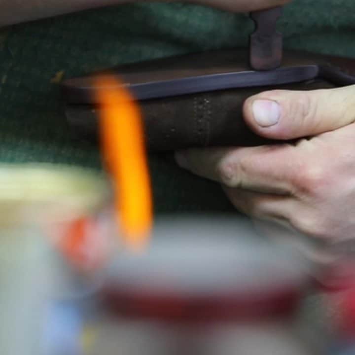 のインスタグラム：「Step 8 | Edge & Sole Finishing  One of the final stages and the next highly skilled step in our production is the edge & sole finishing.  The sole edges are trimmed to the perfect shape of the last - a step like many other done free-hand by the skilled hands of our artisans.  Hereafter the edges and the soles are stained and wax is applied, to provide a waterproof seal and our specific shine.  Our artisans take pride in their work and, equally, we take pride in them.  #mysaintcrispins #forgentlemenonly #forthediscerningfew #saintcrispins #handwelted #handweltedshoes #shoeporn #handmade #howitsmade」