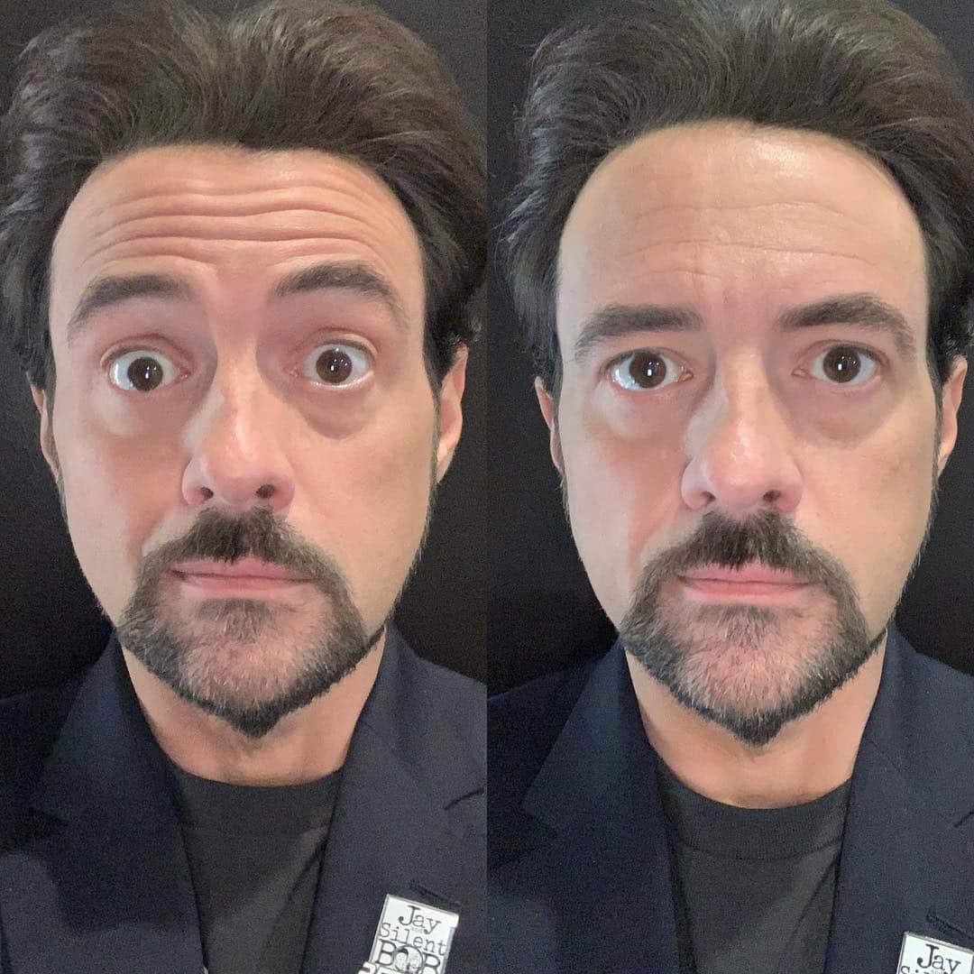 ケヴィン・スミスのインスタグラム：「On the left, my standard “Somebody just slipped a finger up my ass” photo pose. On the right, the often requested “would you do it normal for once” non-pose. I prefer the version on the left because it tells a story. How I present on the left is how I actually feel inside: I’m in an omnipresent state of shock and delight that I somehow got a job in the entertainment biz, found an amazing partner, created another human being, etc. The look on the right doesn’t represent how I feel at all - about anything. It’s how I’ll likely look when I’m dead one day, and there is no more story to tell. So for the folks who wanna know why I always make with the wide-eyes? I work my face like a Muppet because I’m reflecting what I feel on the inside. It may be a conscious affectation but ironically, it coveys an absolute truth: I like being on this side of the dirt. (For all the folks who said I looked good in the video yesterday, all credit goes to @iamemilydawn for making me look not so 48 with makeup and magic hair!) #KevinSmith」