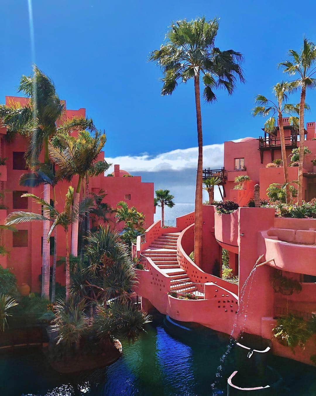BEAUTIFUL HOTELSさんのインスタグラム写真 - (BEAUTIFUL HOTELSInstagram)「All pink everything 💕 Directly south of Portugal lies a tropical paradise called the Canary Islands. This luxurious, vibrant Ritz-Carlton resort sits atop a cliff in Tenerife, the largest of the islands and is designed with the Moorish architecture style in mind. Tag your blogger friends who'd die over this great photo-op! (📷: @celmatique 📍: The Ritz-Carlton Abama, Tenerife, Spain)」5月3日 4時36分 - beautifulhotels