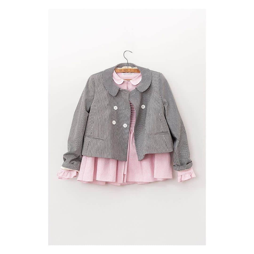 キャベジズ&ローゼズのインスタグラム：「Indulge your sweet tooth with our Candy Stripes ❤ The Hettie Jacket is classic Cabbages & Roses and now available online and in our Midhurst store. A simply stunning double-breasted cropped jacket, Hettie is made from British cotton drill and features a darling Peter Pan Collar and contrasting white buttons. She looks marvellous with the Perdie Shirt in Pink Seersucker 👉Swipe to see more👈 #newarrivals😍 #candystripe #seersucker #pinkshirt #croppedjacket #peterpancollar #stripedjacket #madeinengland🇬🇧 #cabbagesandroses #cabbagesandrosesfashion @christina_strutt @cabbagesandroses_shop 👆Link In Bio👆」