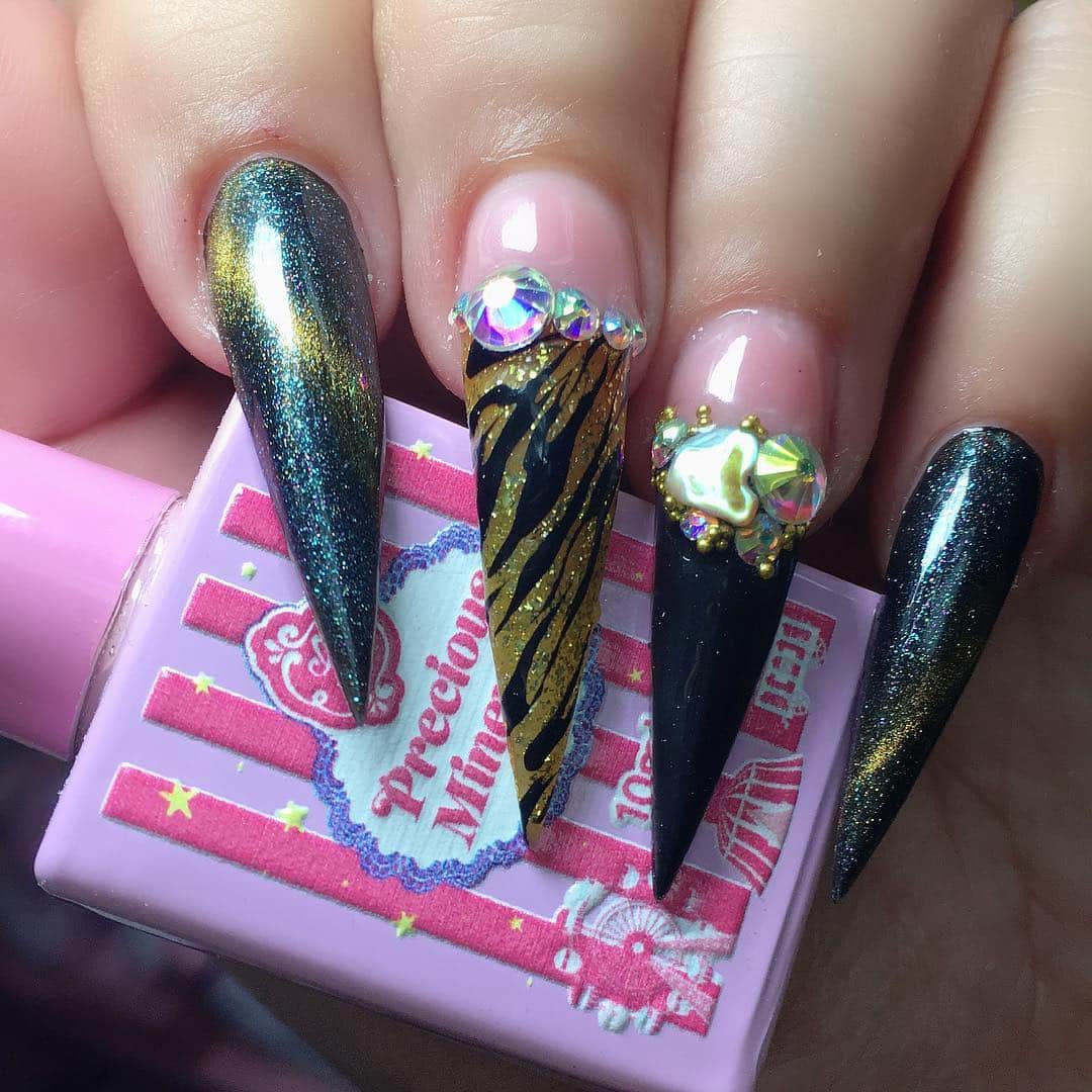 Max Estradaさんのインスタグラム写真 - (Max EstradaInstagram)「Enailcouture.com 3D magic colors from precious minerals gel polish! Over 30 cat eye colors to choose from and 3 different magnets to choose from for the most magical nail art !  #ネイル #nailpolish #nailswag #nailaddict #nailfashion #nailartheaven #nails2inspire #nailsofinstagram #instanails #naillife #nailporn #gelnails #gelpolish #stilettonails #nailaddict #nail #💅🏻 #nailtech#nailsonfleek #nailartwow #네일아트 #nails #nailart #notd #makeup #젤네일  #glamnails #nailcolor  #nailsalon #nailsdid #nailsoftheday Enailcouture.com happy gel is like acrylic and gel had a baby ! Perfect no mess application, candy smell and no airborne dust ! Enailcouture.com」4月30日 7時39分 - kingofnail