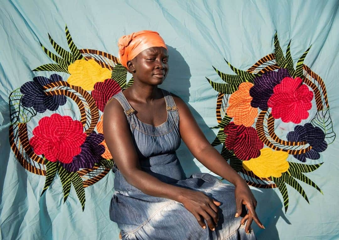 ナショナルジオグラフィックさんのインスタグラム写真 - (ナショナルジオグラフィックInstagram)「Photo by @noralorek | In a courtyard next to her house, Rose Jaun oversees a group of women making "milayas," traditional South Sudanese bedsheets with ornate designs. She fled war in South Sudan to the Bidibidi refugee camp in Uganda, where she started a collective for women to sew and sell milayas. What began as an @natgeo assignment is now the @milayaproject, a nonprofit I just launched on Kickstarter to connect South Sudanese women with customers who want to buy hand-embroidered pillowcases, bedspreads, and wall hangings. The civil war in South Sudan has displaced two million people. When refugees arrived in Uganda they carried their only possessions wrapped in milayas. Today in Bidibidi, the second largest refugee camp in the world, milayas are being sewn, but there are few customers. Follow @milayaproject for more information on how to support these women.」4月30日 1時33分 - natgeo