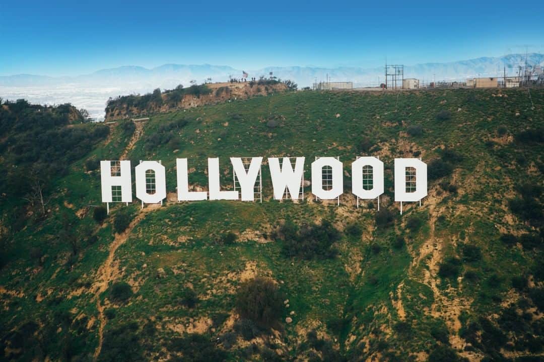 nyonairさんのインスタグラム写真 - (nyonairInstagram)「The Hollywood sign is one of the icons of the American Dream! We’ve outlined some super cool facts that most people don’t know. . When developers put up a larger-than-life advertisement for their new L.A. housing development in 1923, they had no idea it would become one of the most iconic landmarks of all time. Originally intended to last for just 18 months, the Hollywood sign is fast approaching its 100th birthday. . The sign was built on Mount Lee by Los Angeles Times publisher Harry Chandler to advertise his new, upscale housing development called “Hollywoodland.” As if 43-foot letters didn’t attract enough attention, Chandler also had them lit with 4,000 20-watt bulbs, spaced eight inches apart. . Maintenance of the iconic sign fell by the wayside during the Great Depression, and by the mid-1940s, the sign was looking pretty sad. The “H” even fell down. Though the L.A. Recreation and Parks Commission wanted it completely torn down, the Hollywood Chamber of Commerce had different ideas. They offered to remove the “LAND,” then restore the remaining nine letters to promote the town. . Residents of Beachwood Canyon, which is where the original Hollywoodland housing development would have been, are none too happy about tourists trampling their neighborhood in order to get to the Hollywood sign. They’ve put up illegal signs, painted curbs red to deter parking, and even installed a large “TOURISTS GO AWAY” sign nearby. But they’ve also taken high-tech masking measures by getting GPS directions to the sign changed on Google Maps, Apple Maps, and Bing. (Wow!) . Don’t forget to drop a comment on what surprised you or any other fun facts you know. . 🚁 Get 30% Off + Half Off Ground Transportation - Use Code THANKSMOM30! 🚁 . . Ultimate flexibility with our BNSL - valid for more than a year. . . . . . #earthpix #bestvacations #loveauthentic#exploremore #moodygrams #streetdreamsmag #complex #stpatricksday #esquire #icapture_nyc #jointhemvmt#bucketlist #timeoutnewyork #wildnewyork#newyork_instagram #lensbible#thingstodoinnyc #adventurelifestyle #travelexperience #adventuretravel#winterinnewyork #traveldeawls #centralpark #timessquare」5月1日 8時15分 - nyonair