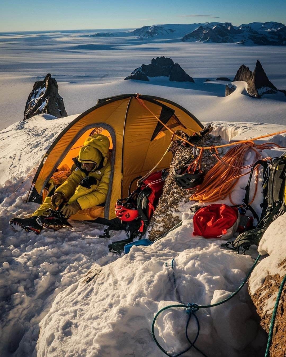 National Geographic Travelさんのインスタグラム写真 - (National Geographic TravelInstagram)「Photo by @jimmychin | You never know what you’re going to get on a “camping” trip with @conrad_anker. Our trip to Antarctica was one of the best “camping” trips I’ve done. We happened to find this nice little spot that we both considered one of the best campsites we’d ever stayed at. Perched on an icy knife-edge ridge a few thousand feet up a remote alpine route, the position was hard to beat. For more mountain adventures around the world, follow @jimmychin.」5月2日 4時11分 - natgeotravel