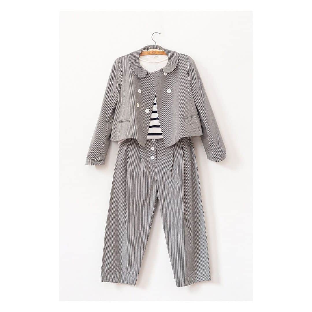 キャベジズ&ローゼズのインスタグラム：「Follow Suit 💖 A most delicious black and ivory stripe combination. The Hettie Jacket and Camilla Trousers compliment your wardrobe with wit and charm. Add in the Sienna Sweater and you have a wonderful melange of stripes on stripes on stripes 👉Swipe to See More👈#suitstyle #newarrivals😍 #candystripes #stripes #stripestyle #britishfabric #madeinengland🇬🇧 #slowfashionstyle #cabbagesandroses #cabbagesandrosesfashion @christina_strutt @cabbagesandroses_shop 👆Link In Bio👆」