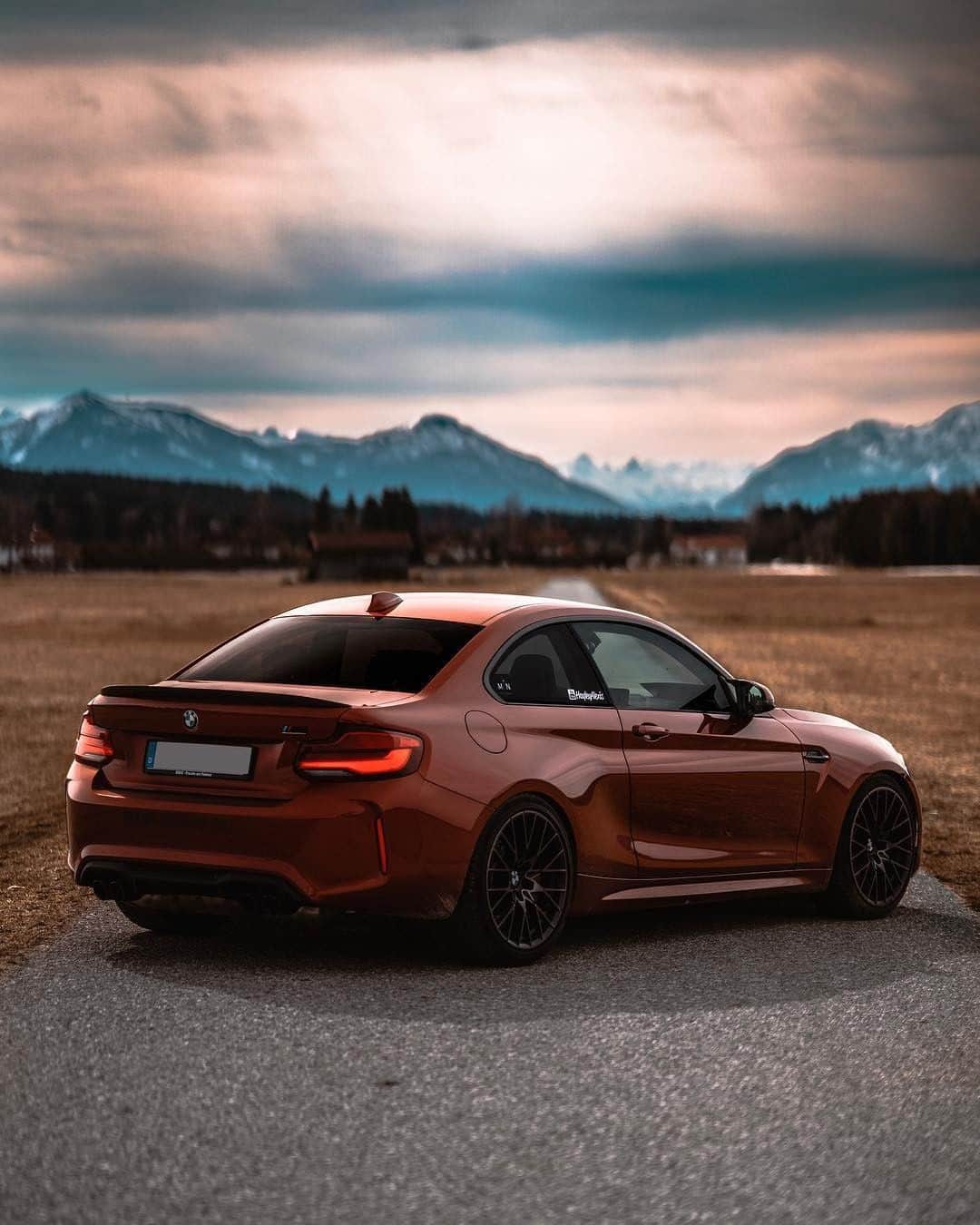 BMWのインスタグラム：「Iconic piece of great performance. The BMW M2 Competition. #BMWrepost @mpn.photography #BMW #M2 #BMWM __ BMW M2 Competition: Fuel consumption in l/100 km (combined): 10.0 - 9.8 (9.2 - 9.0).CO2 emissions in g/km (combined): 227 - 224 (209 - 206).The figures in brackets refer to the vehicle with seven-speed M double-clutch transmission with Drivelogic. The values of fuel consumptions, CO2 emissions and energy consumptions shown were determined according to the European Regulation (EC) 715/2007 in the version applicable at the time of type approval. The figures refer to a vehicle with basic configuration in Germany and the range shown considers optional equipment and the different size of wheels and tires available on the selected model. The values of the vehicles are already based on the new WLTP regulation and are translated back into NEDC-equivalent values in order to ensure the comparison between the vehicles. [With respect to these vehicles, for vehicle related taxes or other duties based (at least inter alia) on CO2-emissions the CO2 values may differ to the values stated here.] The CO2 efficiency specifications are determined according to Directive 1999/94/EC and the European Regulation in its current version applicable. The values shown are based on the fuel consumption, CO2 values and energy consumptions according to the NEDC cycle for the classification. For further information about the official fuel consumption and the specific CO2 emission of new passenger cars can be taken out of the „handbook of fuel consumption, the CO2 emission and power consumption of new passenger cars“, which is available at all selling points and at https://www.dat.de/angebote/verlagsprodukte/leitfaden-kraftstoffverbrauch.html.」