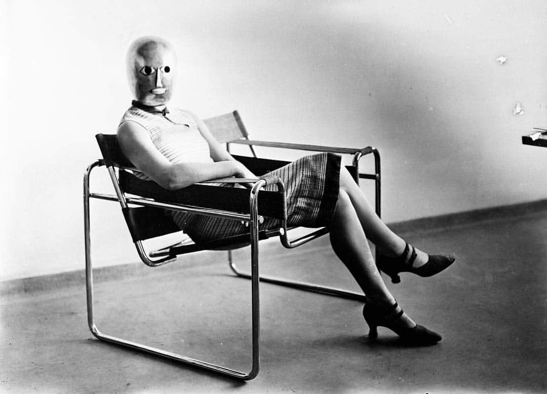 ZOO Magazineさんのインスタグラム写真 - (ZOO MagazineInstagram)「For our upcoming summer issue #63 and the celebration of Bauhaus for its 100 years of existence, ZOO Magazine will devote an inside special to the Bauhaus and brands who’ve been inspired by them throughout the years.  The Wassily Chair in this picture was designed by Marcel Breuer in 1925, taking inspiration from the frame of a bicycle and influenced by the constructivist theories of De Stijl movement.  Woman wearing a theatrical mask by Oskar Schlemmer and seated on Marcel Breuer’s tubular-steel chair, c.1926. Photo: Erich Consemüller, Bauhaus-Archiv Berlin © Dr. Stephan Consemüller  ___ #bauhaus100 #marcelbreuer #zoomagazine #special #nextissue #wassilychair #oskarschlemmer」5月2日 23時57分 - zoomagazine