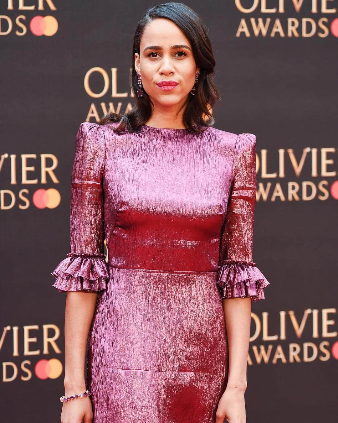 British Vogueさんのインスタグラム写真 - (British VogueInstagram)「#ZaweAshton’s wardrobe is a veritable list of #BritishVogue editor-approved brands. Her latest turn at the #OlivierAwards saw her wear one of @SusieCaveOfficial's whimsical silk georgette “Festival” dresses in a dark berry hue with light-catching silver threads. Click the link in bio to see how the actor is championing a thinking woman's wardrobe and how she's collaborating with @StephWilsonStylist.」4月9日 1時20分 - britishvogue