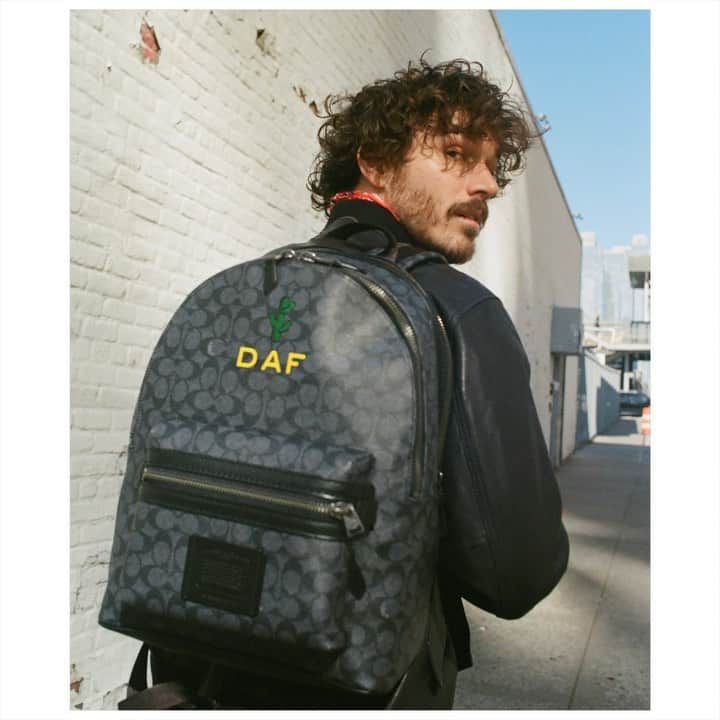 のインスタグラム：「@dafstudio, an artist/photographer/model in New York City, describes his style as "a mix of urban cowboy and crop top workout looks." But he also has a thing for the desert, so he chose to #CoachCreate his Academy Backpack with his initials and a cactus. "I thought the cactus was cute." We agree. Make your mark with our Signature printing then tag us for a chance to appear on our Instagram. #CoachNY」