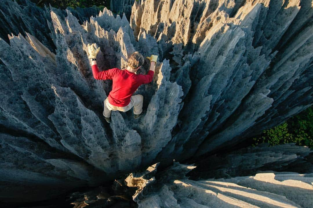 National Geographic Creativeさんのインスタグラム写真 - (National Geographic CreativeInstagram)「Photo by @salvarezphoto | A climber weaves through limestone pinnacles within the Grand Tsingy of Bekopaka, Madagascar. In Malagasy, the formations are called tsingy, meaning "where one cannot walk barefoot." The terrain resists intrusions from hunters, hungry cattle, and wildfires. #Madagascar #Climbing #Exploration」4月9日 23時21分 - natgeointhefield