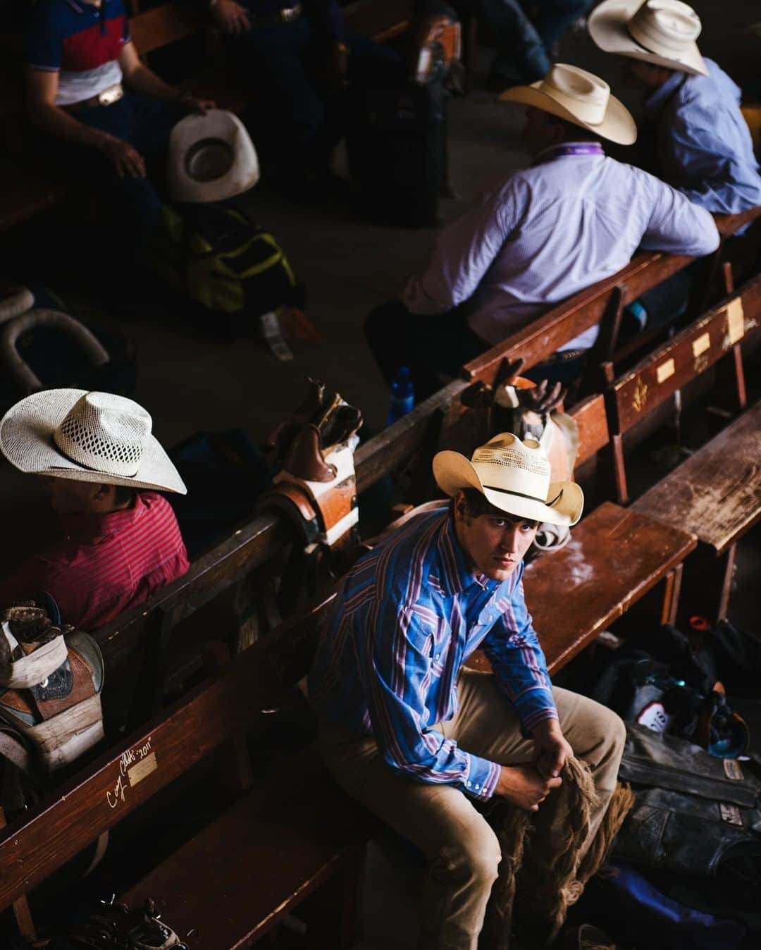 National Geographic Travelさんのインスタグラム写真 - (National Geographic TravelInstagram)「Photo by @max.lowe | I can only imagine the time in the pit that these young cowboys endure while waiting for their turn in the arena riding a wild bull or a bucking bronco is one charged with every thought and emotion. A now long adapted and evolved Western tradition, Rodeo is still one of those things that draws me back to the culture of the American West and it's root.」4月10日 16時04分 - natgeotravel