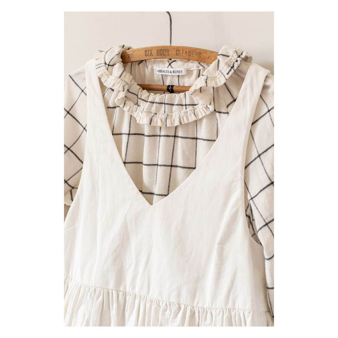 キャベジズ&ローゼズのインスタグラム：「Dress for today and tomorrow ❤ The limited edition Blondie Blouse made from soft Japanese brushed cotton has wonderful ruffles around the neck and can be worn on her own or layered over and under many things. She is pictured here with the Veronica Dress in Calico Blanco(coming very soon) #ootdspring #checks #japanesecotton #newarrivals😍 #madeintheuk🇬🇧 #calicodress #ruffles #limitededition #cabbagesandroses #cabbagesandrosesfashion @christina_strutt @cabbagesandroses_shop」