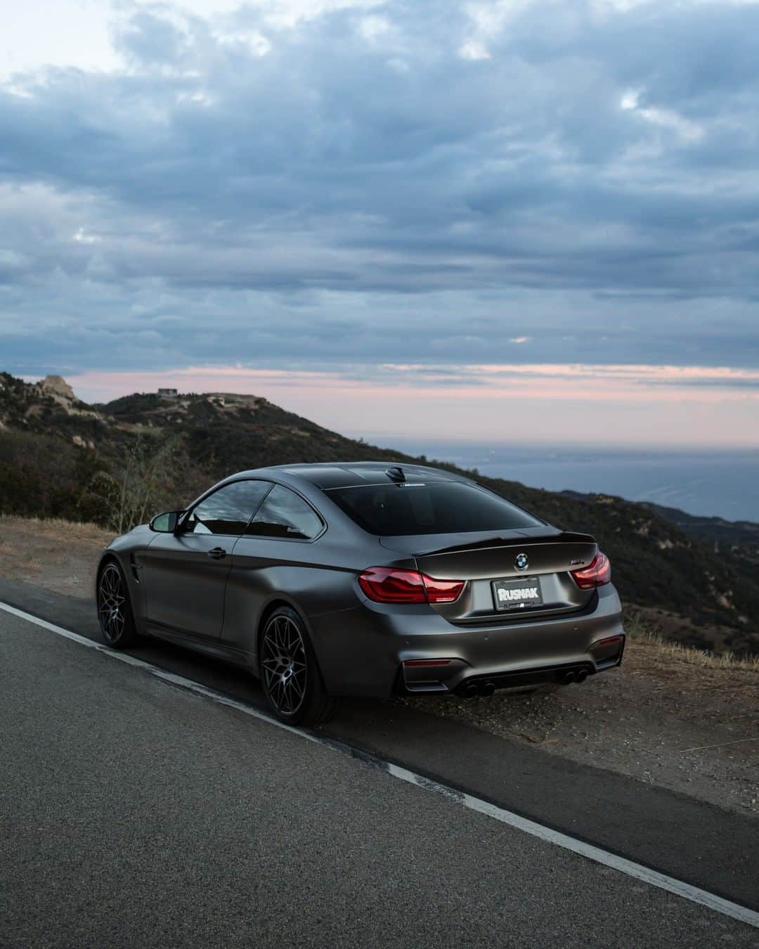 BMWのインスタグラム：「When you let out all the excitement and stop for a quick refill. The BMW M4 Coupé. #BMWrepost @StealthM4 @Prodigy_Photos #BMW #M4 #BMWM __ BMW M4 Coupé: Fuel consumption in l/100 km (combined): 10.0 - 9.9. CO2 emissions in g/km (combined): 227 - 225. The values of fuel consumptions, CO2 emissions and energy consumptions shown were determined according to the European Regulation (EC) 715/2007 in the version applicable at the time of type approval. The figures refer to a vehicle with basic configuration in Germany and the range shown considers optional equipment and the different size of wheels and tires available on the selected model. The values of the vehicles are already based on the new WLTP regulation and are translated back into NEDC-equivalent values in order to ensure the comparison between the vehicles. [With respect to these vehicles, for vehicle related taxes or other duties based (at least inter alia) on CO2-emissions the CO2 values may differ to the values stated here.] The values of the vehicles are preliminary. The CO2 efficiency specifications are determined according to Directive 1999/94/EC and the European Regulation in its current version applicable. The values shown are based on the fuel consumption, CO2 values and energy consumptions according to the NEDC cycle for the classification. For further information about the official fuel consumption and the specific CO2 emission of new passenger cars can be taken out of the „handbook of fuel consumption, the CO2 emission and power consumption of new passenger cars“, which is available at all selling points and at https://www.dat.de/angebote/verlagsprodukte/leitfaden-kraftstoffverbrauch.html.」