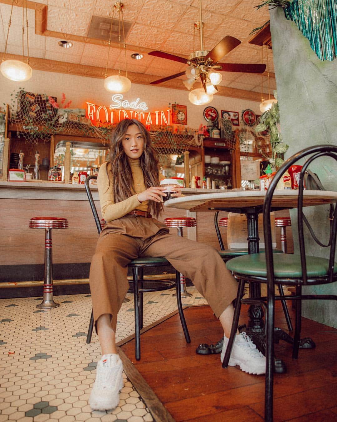 W E Y L I Eのインスタグラム：「No clue what to caption this. But here’s a photo of me at a diner drinking my Chinese herbal tea 😂」