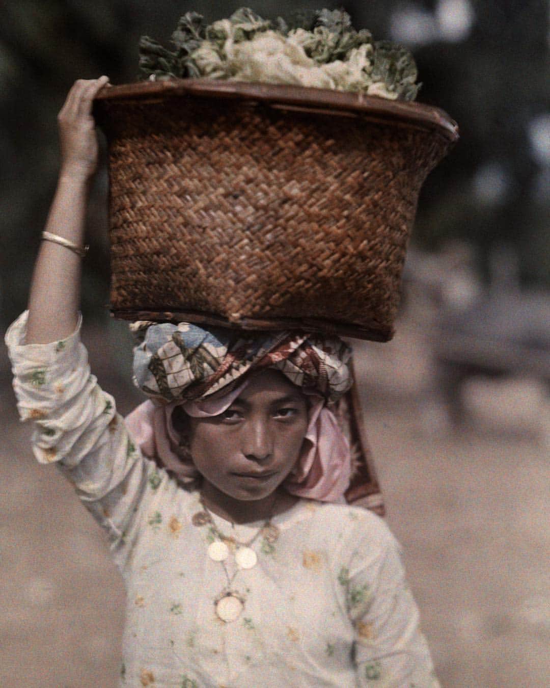 National Geographic Creativeさんのインスタグラム写真 - (National Geographic CreativeInstagram)「Photo by W. Robert Moore | A Padang girl carries a basket of cabbages to a local  market in Sumatra, Indonesia. This image was published in the July 1930 magazine. #ThrowbackThursday #Indonesia #Vintage」4月12日 6時20分 - natgeointhefield