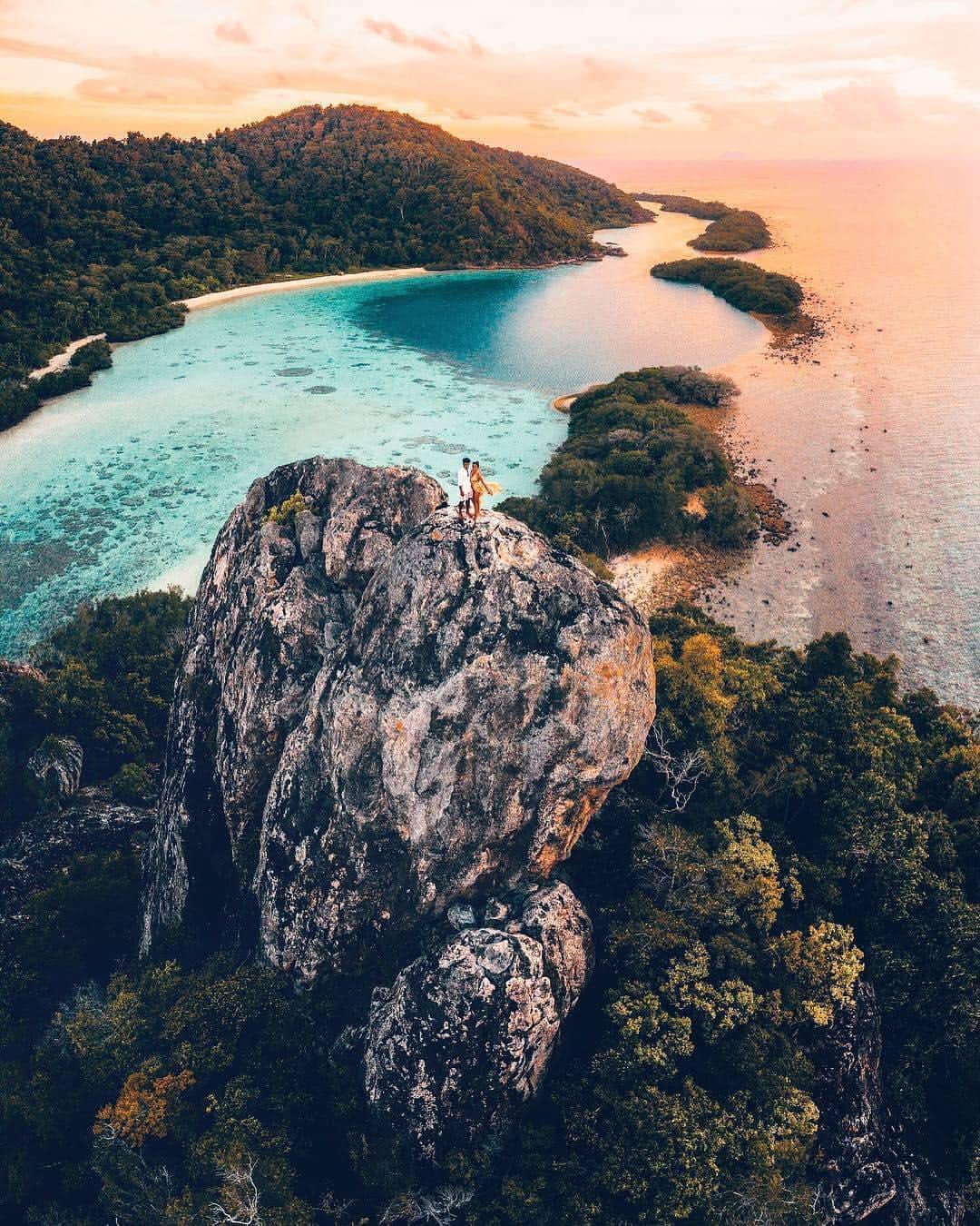 BEAUTIFUL DESTINATIONSさんのインスタグラム写真 - (BEAUTIFUL DESTINATIONSInstagram)「"We paddled out all the way around the island on a canoe without any specific plans. As we were approaching the west lagoon we saw the light hitting the peak of this beautiful rock. Figured why not climb the thing! We trusted our flip flops so much it will do the job it was not designed for.😬 Probably not the best decision we made on this trip but seeing all the shades of red and orange in the sky as the sun starts to set in the horizon as we were reaching the top. There was sigh of relief, we made a risky move but it was sure as hell was all worth it." Would you go the extra mile for this view? (📷: @ninjarod 📍: Bawah, Indonesia)」4月12日 6時49分 - beautifuldestinations