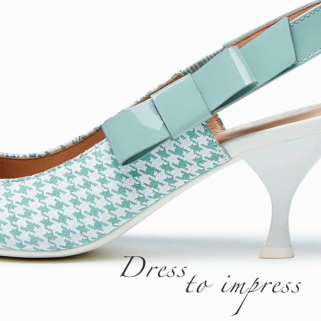 のインスタグラム：「TWO-TONE AZURE PIED DU POLUES: #Slingback sandals with a two-tone #chequered twist. Azure and white hues bring a fresh take to a #classic look. Get ready to celebrate your Spring Days with the perfect outfit!  Thanks to our gorgeous @emilydenando, who's wearing our brand new Pied de poule Elisangel slingback shoes.」