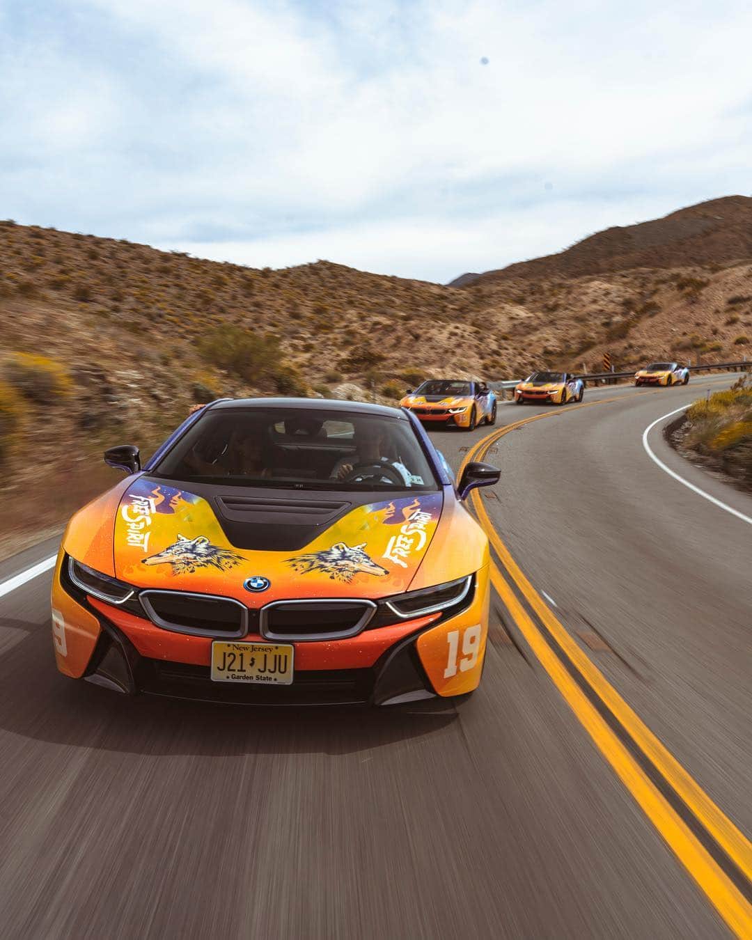 BMWのインスタグラム：「Driven by pure joy. The BMW i8 Roadster and BMW i8 Coupé on the #RoadToCoachella. #BMW #BMWi8 #Roadster #coachella #coachellaready __ BMW i8 Roadster: Energy consumption in kWh/100 km (combined): 14.5.Fuel consumption in l/100 km (combined): 2.0.CO2 emissions in g/km (combined): 46. BMW i8 Coupé LCI: Energy consumption in kWh/100 km (combined): 14.0.Fuel consumption in l/100 km (combined): 1.8.CO2 emissions in g/km (combined): 42. The values of fuel consumptions, CO2 emissions and energy consumptions shown were determined according to the European Regulation (EC) 715/2007 in the version applicable at the time of type approval. The figures refer to a vehicle with basic configuration in Germany and the range shown considers optional equipment and the different size of wheels and tires available on the selected model. The values of the vehicles are already based on the new WLTP regulation and are translated back into NEDC-equivalent values in order to ensure the comparison between the vehicles. [With respect to these vehicles, for vehicle related taxes or other duties based (at least inter alia) on CO2-emissions the CO2 values may differ to the values stated here.] The CO2 efficiency specifications are determined according to Directive 1999/94/EC and the European Regulation in its current version applicable. The values shown are based on the fuel consumption, CO2 values and energy consumptions according to the NEDC cycle for the classification. For further information about the official fuel consumption and the specific CO2 emission of new passenger cars can be taken out of the „handbook of fuel consumption, the CO2 emission and power consumption of new passenger cars“, which is available at all selling points and athttps://www.dat.de/angebote/verlagsprodukte/leitfaden-kraftstoffverbrauch.html.」