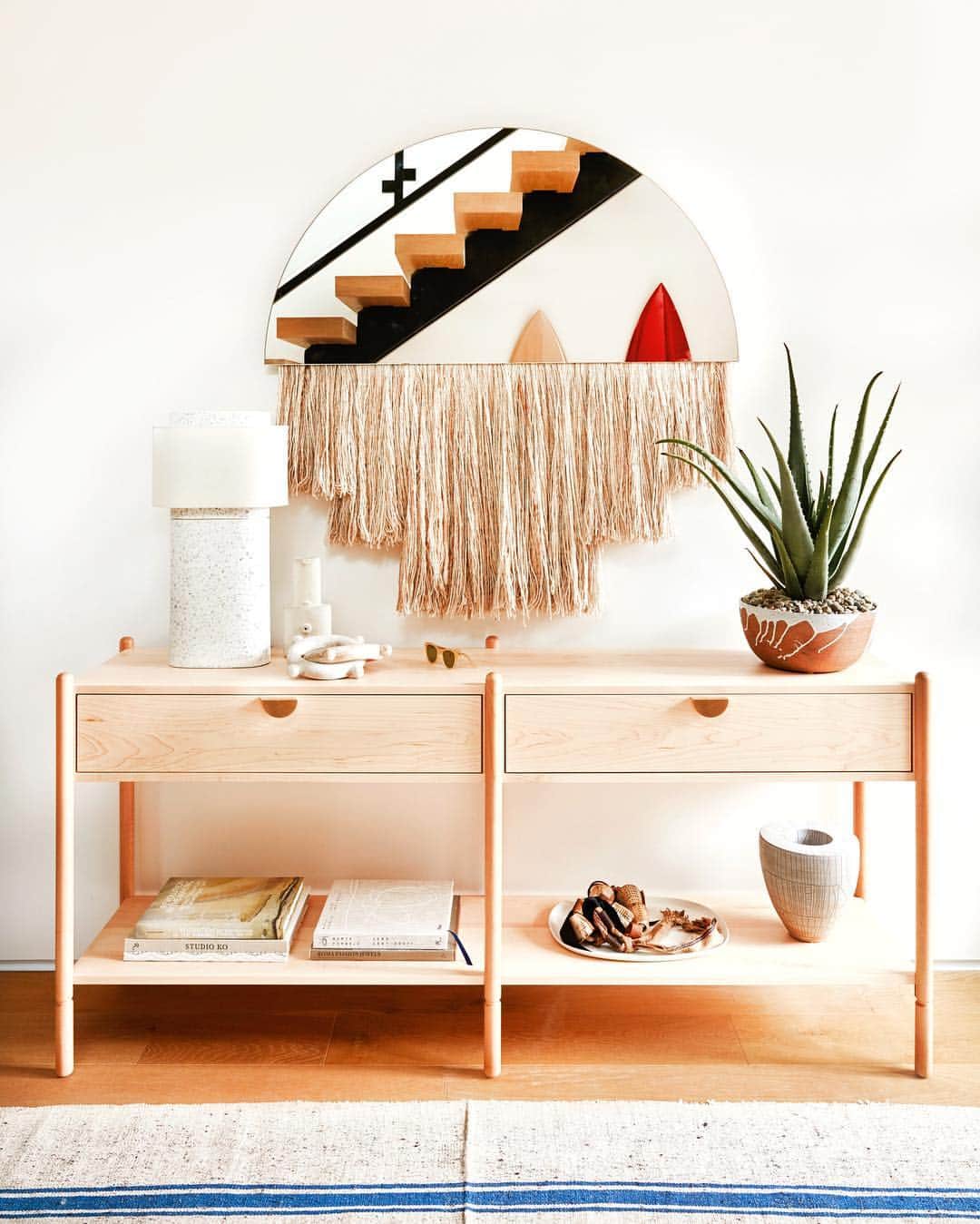 ギャランス・ドレさんのインスタグラム写真 - (ギャランス・ドレInstagram)「First stop when I get home - last stop when I leave home - this is my entryway! It’s good and practical and simple and easy, and there is a lot of things I love in here. . The mirror is an art piece by Ben & Aja Blanc @benandajablanc @thefutureperfect and the console was made to measure based on the Sawyer one by @hedgehousefurniture - sometimes having things made just for you takes a little bit more time (not always a lot more money so it’s worth looking around and asking) but it feels so special - probably like made to measure clothes used to feel? . There are a few other custom-made pieces in the house that I can’t wait to show you. . BIG LOVE to all artists and artisans - thank you for making things special and personal. . For the full house story on @dominomag follow the link in my bio! . Interior designer : @sarahshermansamuel  Photos : @jasonfrankrothenberg  Editor : @kateberryberry  Styled by : @thelocationist_  Thank you @lilyksullivan and all the teams at @atelierdore and @dominomag !!! . Console @hedgehousefurniture  Mirror @benandajablanc @thefutureperfect  Rug @woven.is  Planter @aquestionofeagles  Vase Heather Rosenman @lawsonfenning  Terrazzo lamp @cb2」4月13日 0時25分 - garancedore