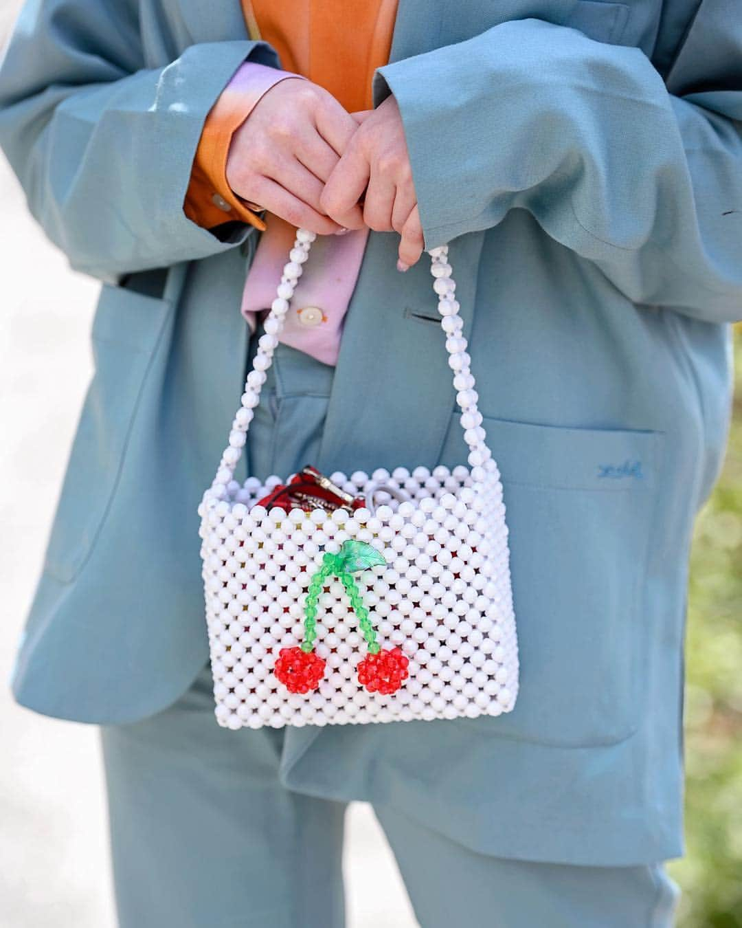 Harajuku Japanさんのインスタグラム写真 - (Harajuku JapanInstagram)「18-year-old Japanese fashion student Ashley (@Ashley__0625) wearing an X-Girl blue suit, Susan Alexandra beaded cherry handbag, and clear shoes by Yello Japan on the street outside of the Vantan Fashion College entrance ceremony in Tokyo.」4月13日 1時31分 - tokyofashion