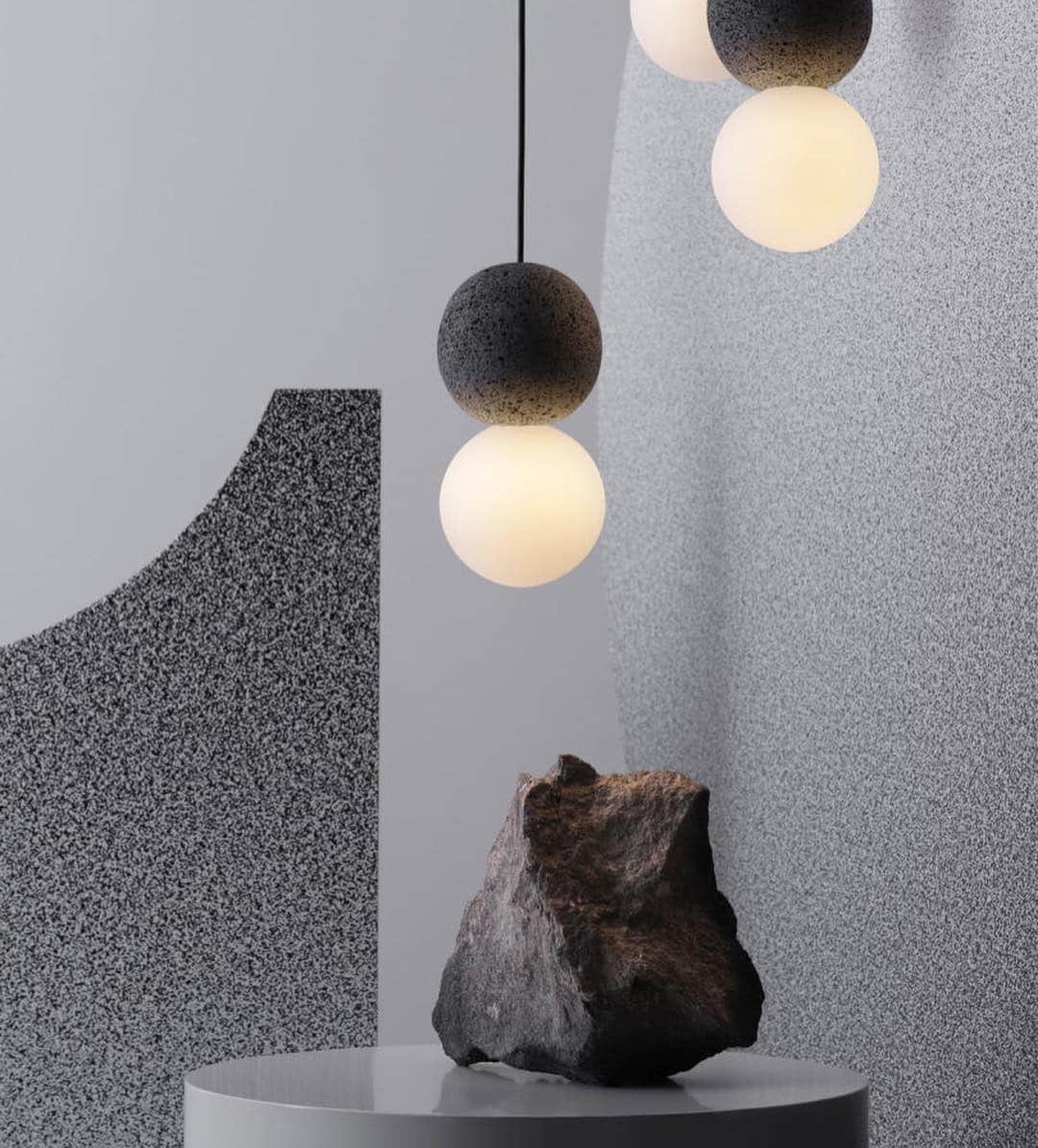 Design Milkさんのインスタグラム写真 - (Design MilkInstagram)「@studiodavidpompa continues to explore mixed materials to create sculptural #lighting with the latest combining volcanic rock and glass. The Origo collection comprises two spheres, one made of volcanic rock and the other a glass globe, revealing a balance of light and dark tones, and rough and smooth textures. \\\ See more of the collection on designmilk.com!」4月13日 3時19分 - designmilk