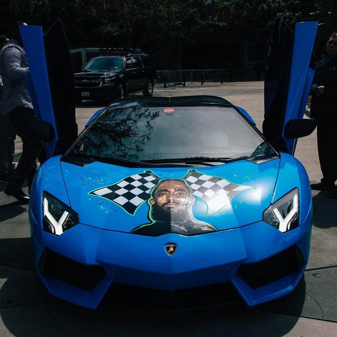 ゲームのインスタグラム：「Now my lambo “Nipsey Blue” #TheMarathonContinues 🏁🏁🏁 [everyday I’m posting something for Nip so that my followers are reminded of his mission, work & legacy FOREVER]. (& people keeping asking me how can they support nips family etc..... Get you #TheMarathonClothing by hitting sales@themarathonclothing.com) #LongLiveNip 🙏🏾 📸 @iamkevinwong」