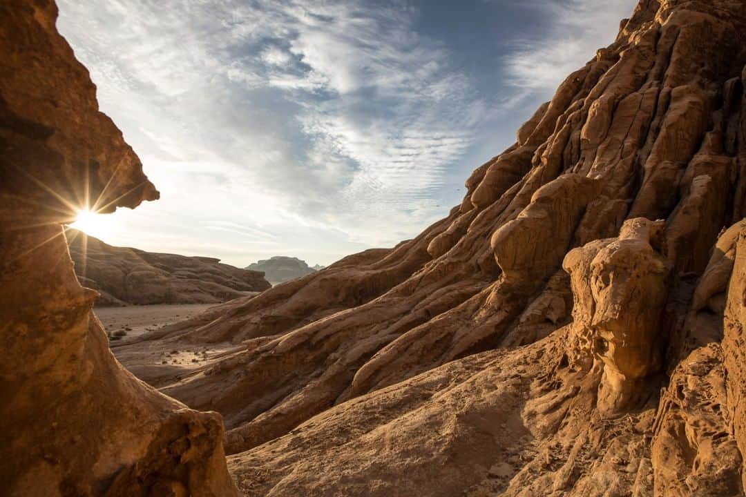 National Geographic Travelさんのインスタグラム写真 - (National Geographic TravelInstagram)「Photo by @johnstanmeyer | Sunset in the amazing unearthly landscape of Wadi Hafeer, located around 20 kilometers outside Wadi Rum in Jordan. I spent a week within this windswept ravines for the part III of the @outofedenwalk project. Over and over this surreal view pull me back to return. @natgeo @natgeoimagecollection #jordan #wadihafeer #sunet #landscape #beauty」4月14日 1時01分 - natgeotravel