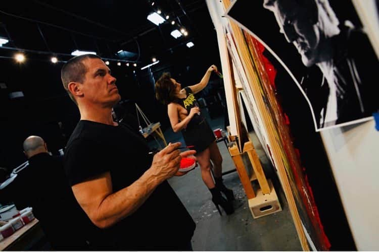 ジョシュ・ブローリンさんのインスタグラム写真 - (ジョシュ・ブローリンInstagram)「Painting with @ladygaga behind the set of Sin City 2. Robert @rodriguez and I, since Grindhouse, everytime we work together and then some, have paintings going, and we run between each take and splash some more color on. Gaga was there for a scene and she painted a portrait of herself — one of the best any of us had come up with. I love this shot because it’s all presentation put aside, and your just left with a newborn expression in the middle of the night, semi-naked, swathed in acrylics, unskilled and raw. Photos by @kathrynbrolin — #georgeyepes」4月13日 21時11分 - joshbrolin