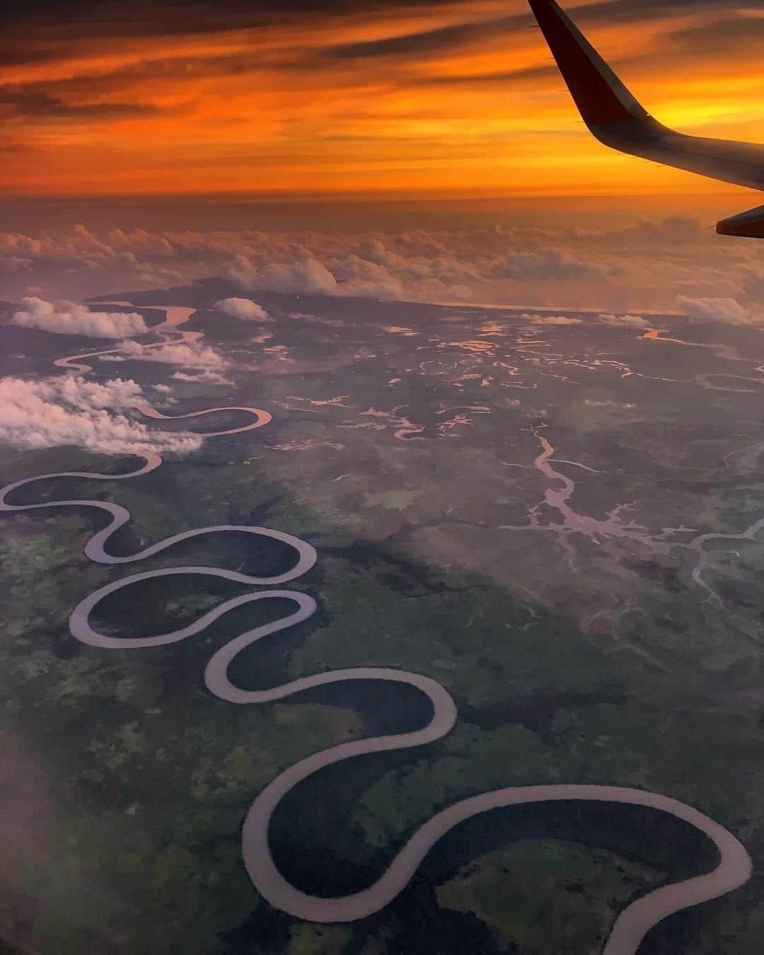 Australiaさんのインスタグラム写真 - (AustraliaInstagram)「Important tip when flying into #Darwin: Always get a window seat! 😍 @toripix86 did exactly that on her recent trip to @ntaustralia, and was treated to this spectacular #sunrise view over the winding #AdelaideRiver. This @tourismtopend river is well-known for its large population of saltwater crocodiles, and you can experience a safe and exciting encounter with them on a ‘jumping crocodile cruise’ with @jumpingcrocodilecruises or @adelaiderivertours. The knowledgeable skippers will tell you all about these prehistoric creatures and their habitat as you watch them leap spectacularly in the air to catch food; it’s a must-do for all the thrill seekers and nature lovers out there. 🐊  #seeaustralia #NTaustralia #tourismtopend #viewfromabove #travel」4月14日 4時00分 - australia