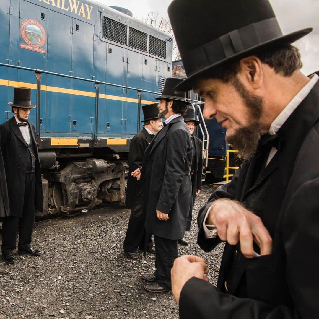 TIME Magazineさんのインスタグラム写真 - (TIME MagazineInstagram)「For 25 years, Abraham Lincoln lookalikes have met for the annual Association of Lincoln Presenters Conference. This year, the group travelled to Blue Ridge to take the scenic historic train ride to McCaysville, Ga. for lunch and shopping. Whit McMahon, right, who has spent 16 years as a Lincoln presenter, is now 56 years old, the same age as Lincoln when he was assassinated. "I'm here to help preserve the memory of Abraham Lincoln," he said. “As a child, whenever our family visited central Kentucky, I would request to visit Abraham Lincoln’s birthplace. This happened on 4-5 different occasions. I believe these were divinely inspired visits and that God had a hand in preparing me for my ultimate role as a Lincoln presenter.” Here, a group of Lincolns hang out in front of the train before departing. Photograph by @benjaminnorman for TIME」4月14日 9時05分 - time