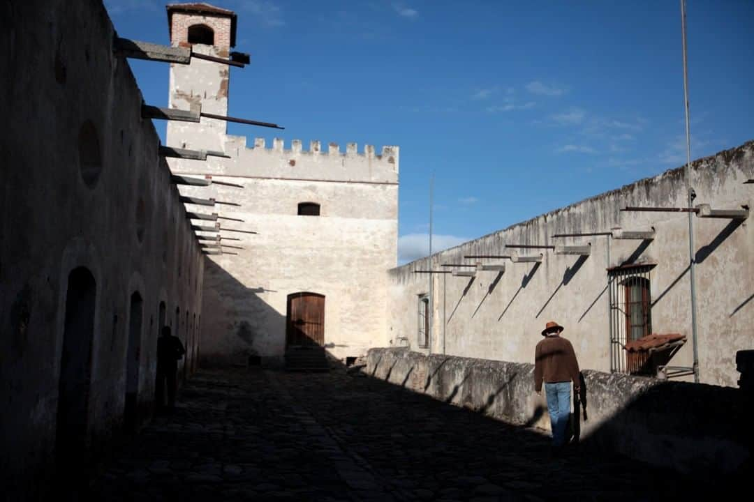 National Geographic Travelさんのインスタグラム写真 - (National Geographic TravelInstagram)「Photo by @sofia_jaramillo5 | A man walks through a hacienda in Tlaxcala, Mexico. Haciendas are large historic estates in South America. They were originally developed when Spain was laborious in its conquering of other countries. The estates were originally involved in mining, livestock, agriculture and served as meeting places for communities. #mexico #travel #hacienda」4月14日 16時03分 - natgeotravel