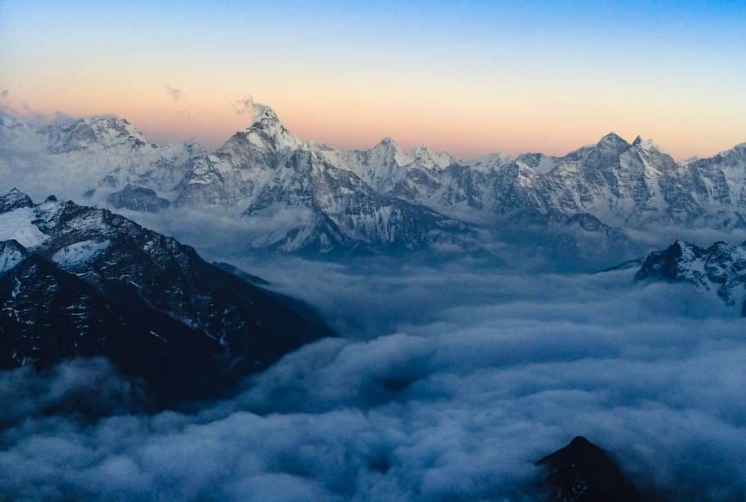 ナショナルジオグラフィックさんのインスタグラム写真 - (ナショナルジオグラフィックInstagram)「Photo by @renan_ozturk | The high Himalaya cozied up against an afternoon fog blanket. Follow @renan_ozturk for more imagery from the roof of the world in the coming months on assignment for @natgeo.」4月14日 23時03分 - natgeo