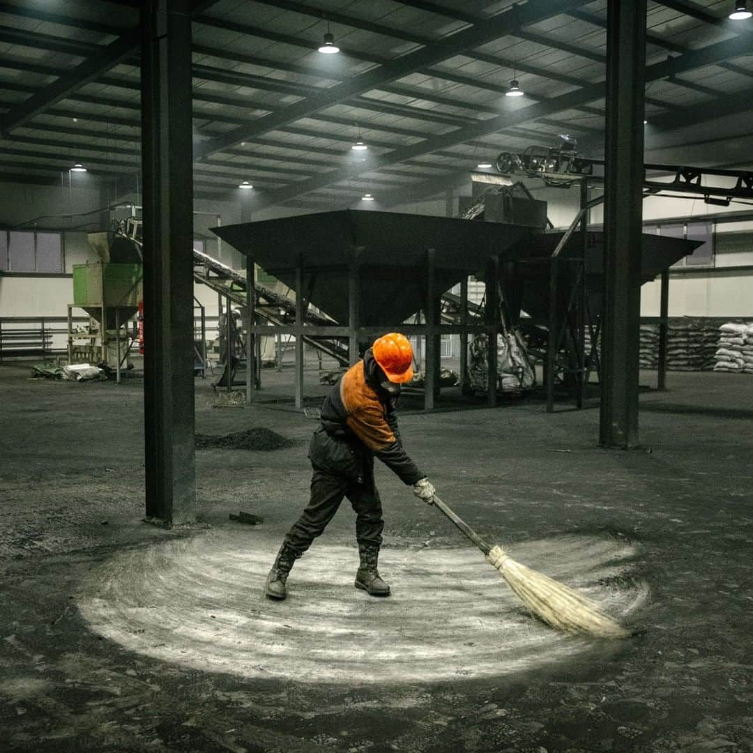 ナショナルジオグラフィックさんのインスタグラム写真 - (ナショナルジオグラフィックInstagram)「Photo by Matthieu Paley @paleyphoto | At a coal refinery near the Mongolian capital of Ulaanbaatar, moisture and some pollutants are removed from coal to make it a "cleaner" and more valuable fuel. A worker sweeping the floor wears a mask to shield him from the fine dust. In Mongolia, at least for now, coal is essential to surviving the brutal winters. But the toll it takes is steep: Ulaanbaatar has some of the world’s most polluted air. From the United States and Germany to India and China, air pollution cuts short an estimated seven million lives globally every year, according to the World Health Organization. This image is part of a story I recently shot for @natgeo. Please visit my profile @paleyphoto for a link to the story. #climatechange #airpollution #mongolia #ulaanbaatar #coal #fossilfuel」4月15日 14時04分 - natgeo