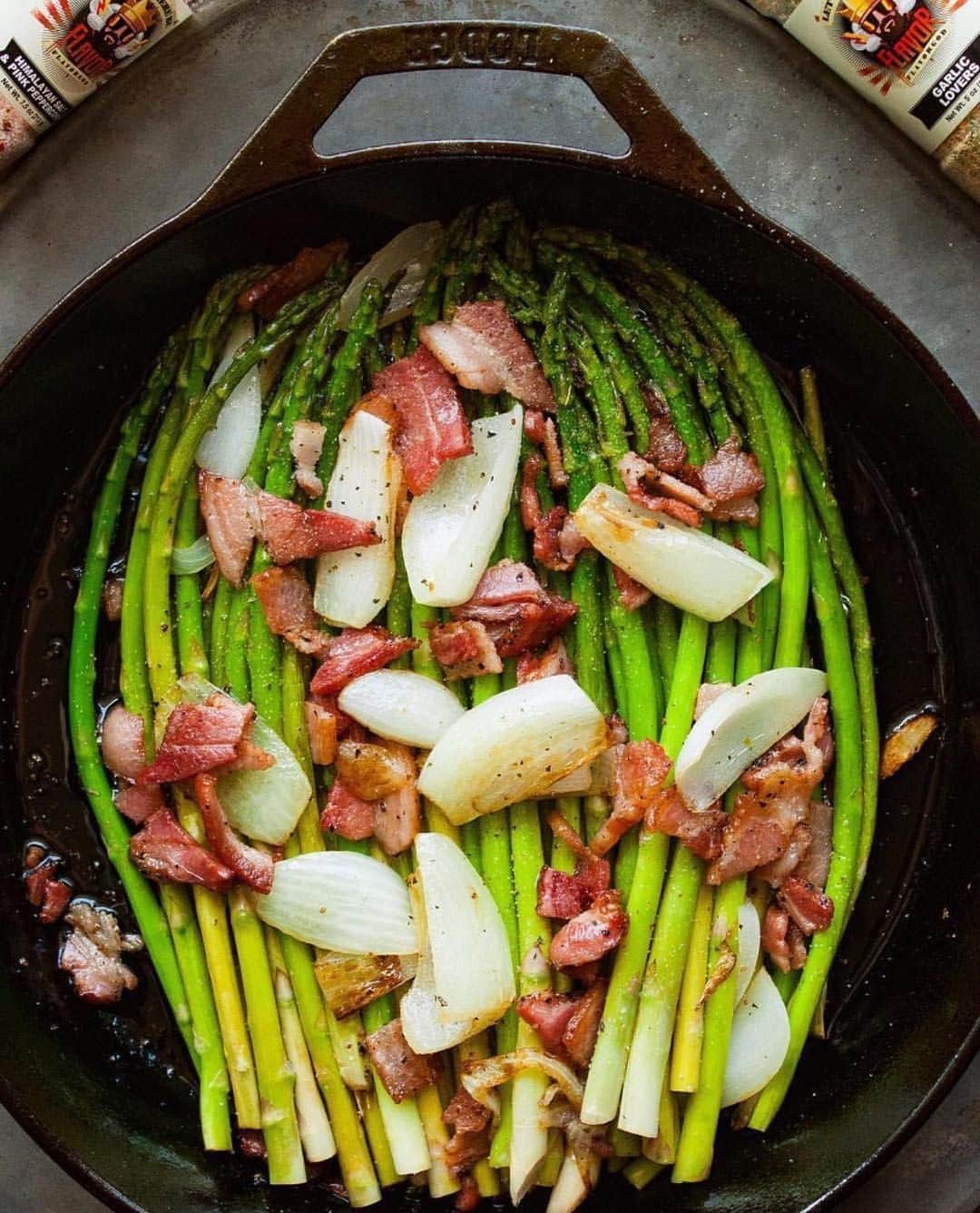 Flavorgod Seasoningsさんのインスタグラム写真 - (Flavorgod SeasoningsInstagram)「Asparagus & Bacon with Onions⁣ -⁣ Build Your Own Bundle Now!!⁣ Click the link in my bio @flavorgod ✅www.flavorgod.com⁣ -⁣ This recipe yields skillet cooked asparagus, bacon, and onions with my Garlic Lovers and Pink Salt and Pepper 😎👍‼️🔥⁣ -⁣ @5280meat:⁣ -⁣ Ingredients:⁣ Asparagus⁣ 2Tbsp ghee/butter/cooking oil⁣ ¼ onion sliced⁣ @flavorgod Garlic Lovers & Himalayan Pink Salt and Pink Peppercorn⁣ @5280meat Black Pepper Bacon (cut into small pieces)⁣ -⁣ Directions:⁣ In a large skillet, warm ghee/butter/cooking oil on medium heat. Add in asparagus and cook for about 7-10 minutes on medium-high heat seasoning as you cook. Move asparagus to side of skillet and then add onion and bacon. Cook for another 5 minutes, until the onion browns and the bacon is cooked to your liking. Mix together your asparagus, onion and bacon and serve!⁣」4月16日 9時32分 - flavorgod