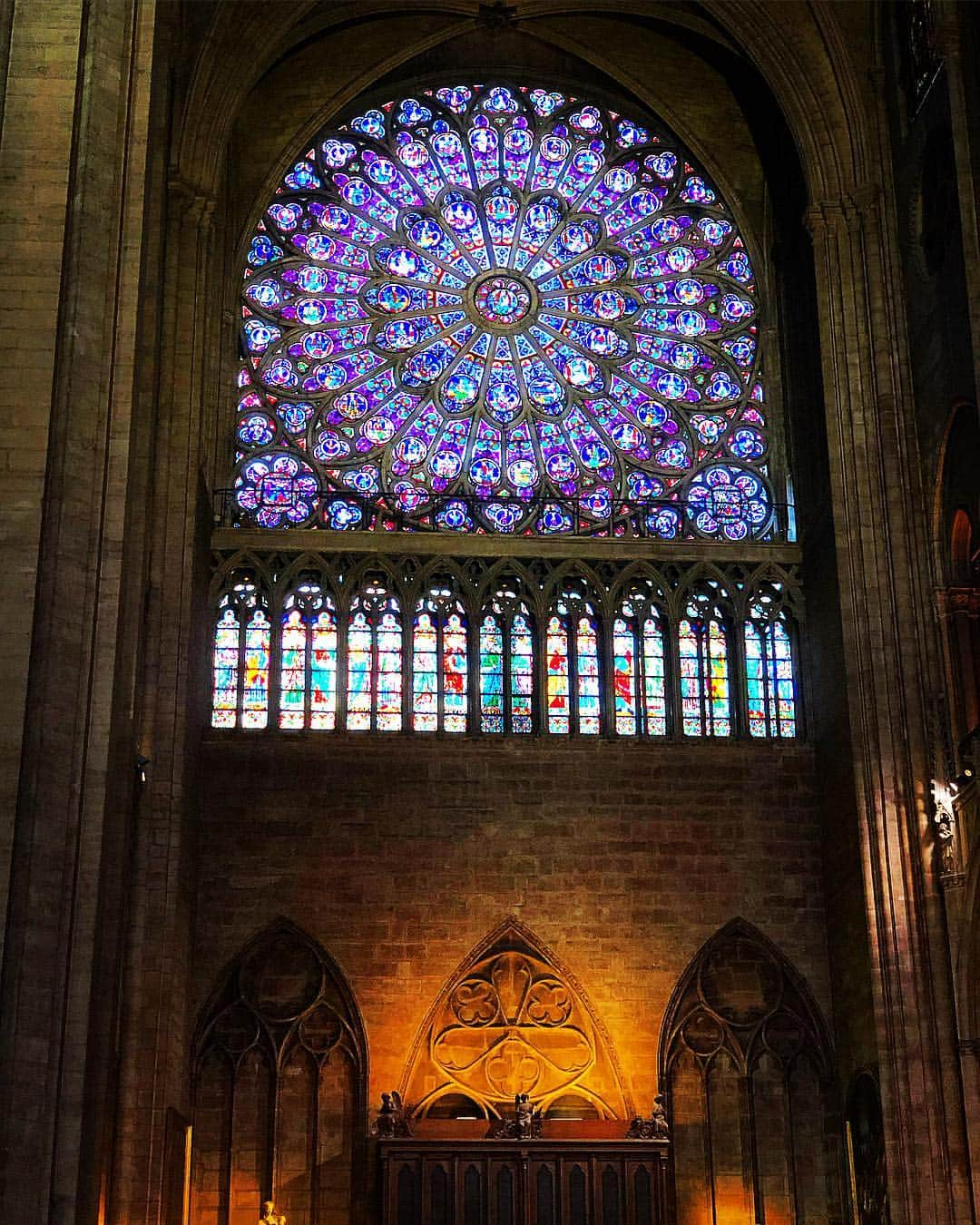 ラファエル・スバージさんのインスタグラム写真 - (ラファエル・スバージInstagram)「Please pray for #notredame  now in flames and facing a very rough road ahead.  My heart breaks to think of even a single part of this structure being damaged or affected by this tragedy.  I was there just a week ago and took so many photos of the interior, because as with any great cathedral of this size and magnitude it’s impossible to capture with any one shot, any one angle. Everywhere you look, in every direction, it takes your breath away— up, down, from every corner, this is a masterpiece, the purest expression of spirit on a physical plane. We are reminded of other worlds as we stand under the stained glass, with colors seen no where else in history.  Notre Dam is a place to commune with the highest expression of “God” as expressed through architecture, and as a result we are elevated by its very presence.  To the people of #France, of #Paris and all citizens of the world, this is a heartbreaking moment. Let us pray for this mighty treasure, this manifestation of spirit in the form of a cathedral. We send you love and our hearts embrace. 🙏🙏」4月16日 5時12分 - raphaelsbarge