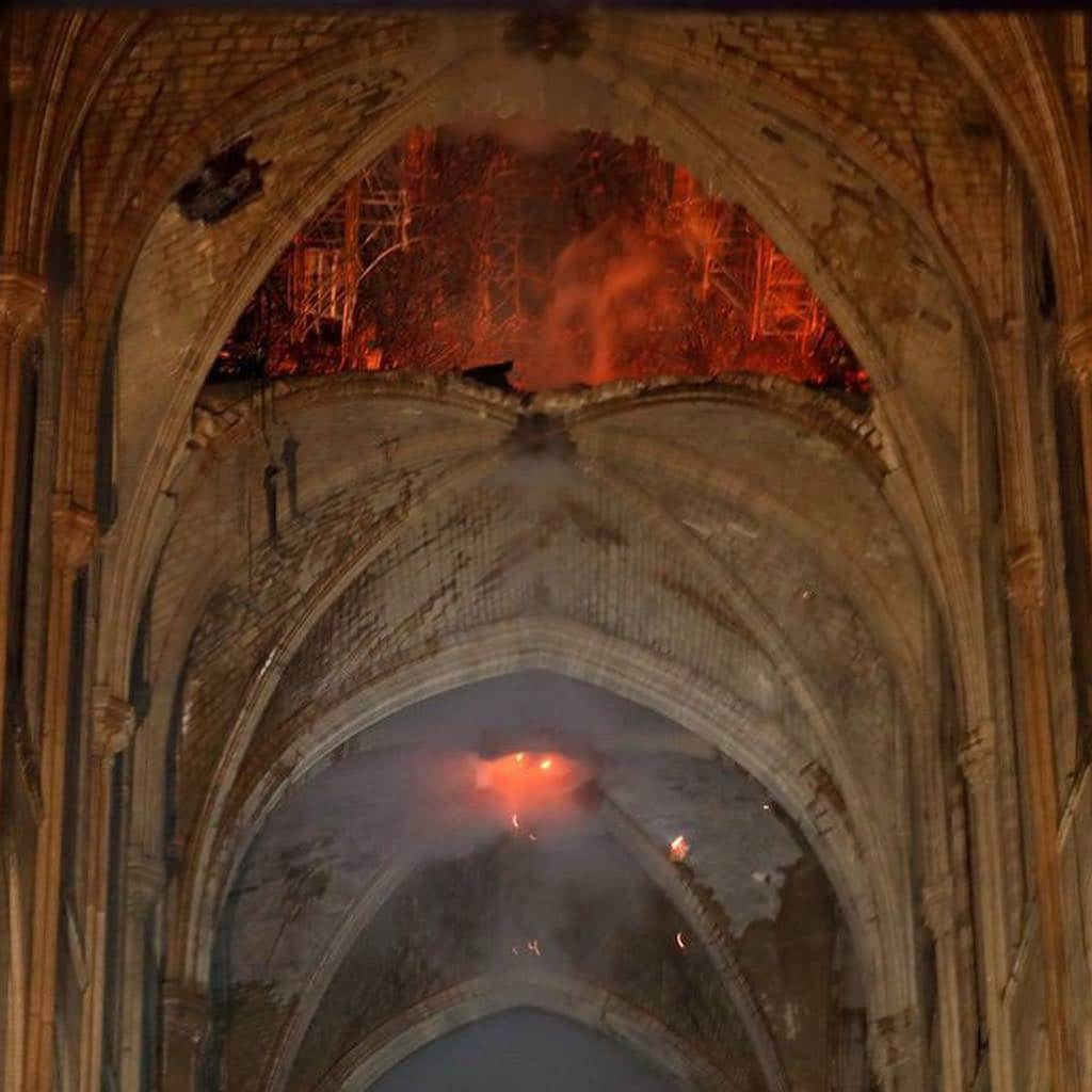 CNNさんのインスタグラム写真 - (CNNInstagram)「A devastating fire may have gutted Notre Dame in Paris — but amid the smoke and ash, the cathedral’s altar and cross are still intact. The blaze raged for several hours on Monday evening before 400 firefighters managed to bring it under control. However, they were unable to save the spire, which burned to a blackened shell before finally toppling as thousands of Parisians watched in horror from the streets. But the building’s iconic facade and towers were salvaged, as were a host of invaluable artifacts and works of art stored inside. An investigation into what caused the fire has been opened, and French President Emmanuel Macron has vowed that the cathedral will be rebuilt. Photos: Philippe Wojazer / French Interior Ministry / Getty Images」4月16日 18時00分 - cnn