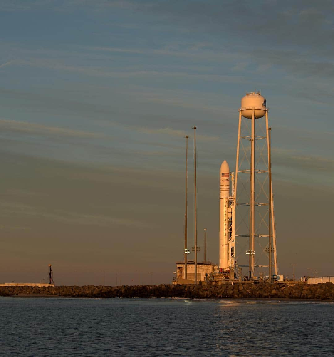 NASAさんのインスタグラム写真 - (NASAInstagram)「🚀🚀🚀 A @NorthropGrumman #Antares rocket carrying a #Cygnus resupply spacecraft is seen on Tuesday, April 16 during sunrise on Pad-0A at @NASAWallops Flight Facility in Virginia. Set to launch on Wednesday, April 17 at 4:46 p.m. EDT, this will be the company's 11th contracted cargo resupply mission to the International Space Station (@ISS) to deliver about 7,600 pounds of science and research, crew supplies and vehicle hardware to the orbital laboratory and its crew.  Credit: NASA/Bill Ingalls #Launch #Rocket #NASA #LaunchPad」4月17日 1時56分 - nasa