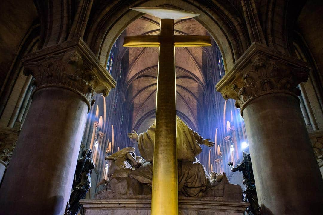 National Geographic Travelさんのインスタグラム写真 - (National Geographic TravelInstagram)「Photo by @jonathankingston | I was heartbroken to watch Notre Dame engulfed in flames. In the news coverage I saw a photo from inside of the church–its shattered ceiling gaping open to the sky–and this iconic cross still standing above Nicolas Coustou’s sculpture “Descent from the Cross” at the far end of the collapsed cathedral’s roof. The hands of the statue are raised as if in disbelief of the tragedy it was beholding. My heart is in Paris today.  Swipe to see more views of Notre Dame.  #NotreDame #Paris #France」4月17日 10時00分 - natgeotravel