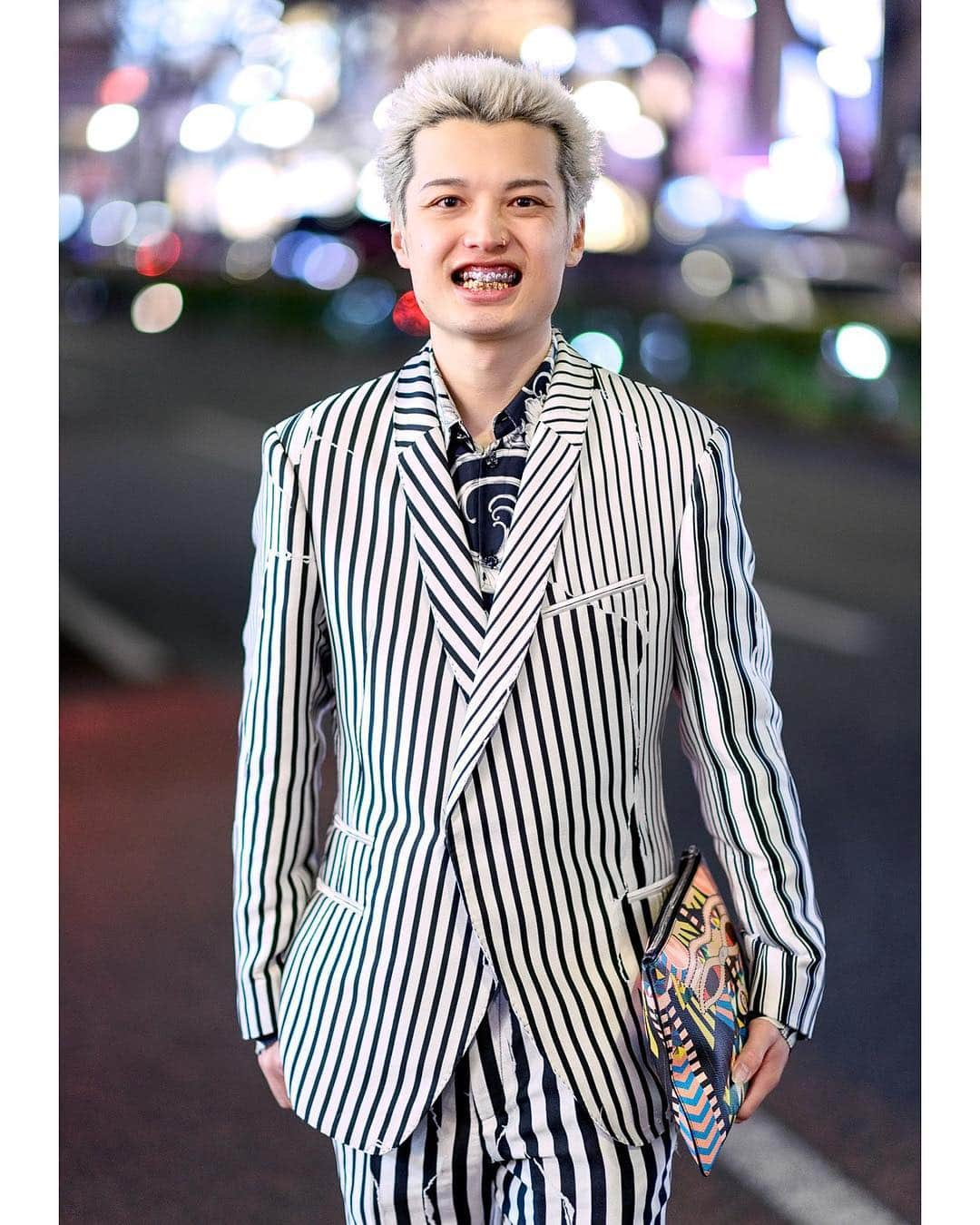 Harajuku Japanさんのインスタグラム写真 - (Harajuku JapanInstagram)「Japanese college student Shun (@madonna.77768) on the street in Harajuku wearing a striped suit by Haider Ackermann with a Versace print button up shirt, Givenchy clutch, and Nike sneakers.」4月18日 0時21分 - tokyofashion