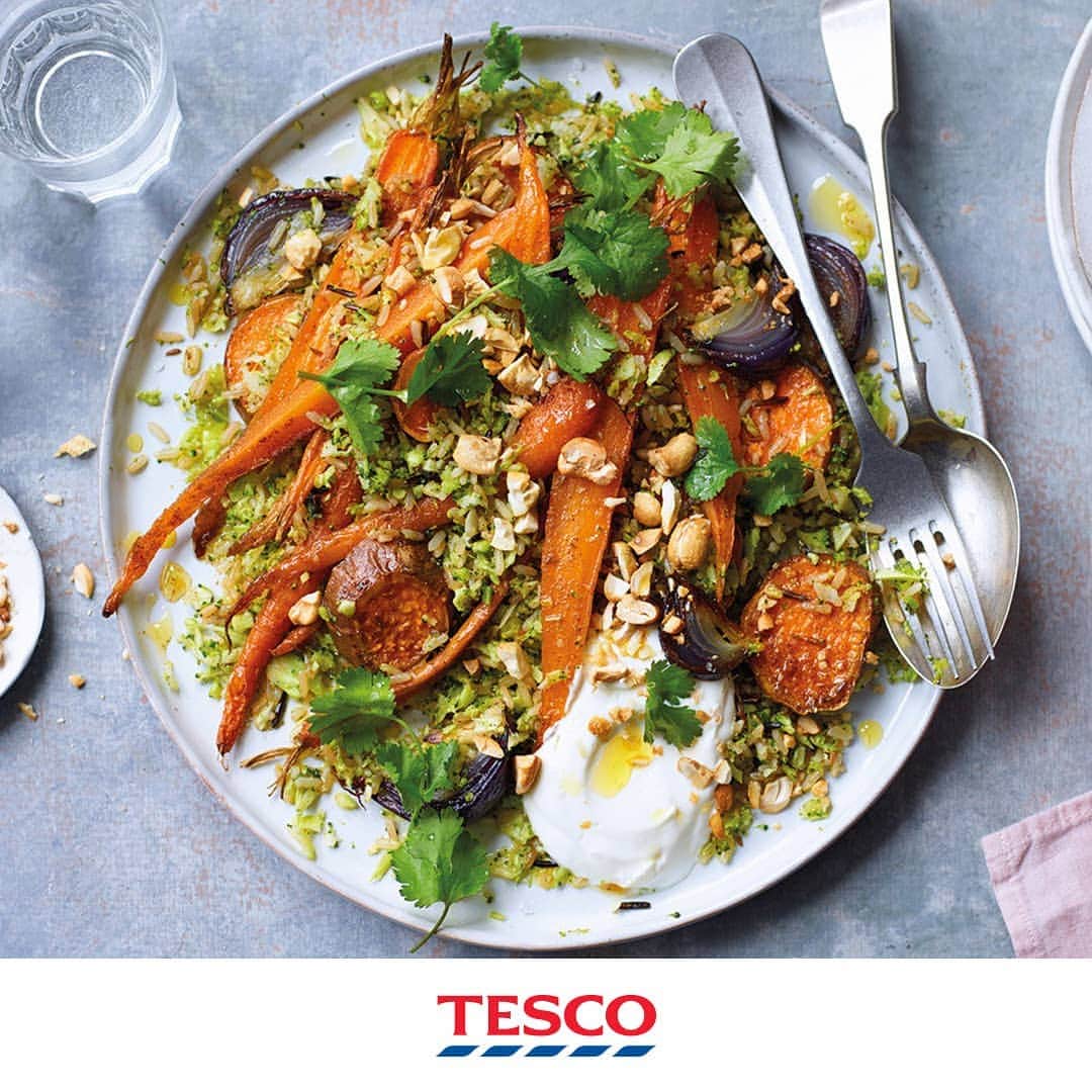 Tesco Food Officialさんのインスタグラム写真 - (Tesco Food OfficialInstagram)「Before jumping headlong into the Easter feasting, indulge in a dose of big beautiful veggies with this mighty pilaf. Packed with herbs and pulses, it’ll help you bound through the week. #HopToTesco🐰 to pick up everything you need for this dish. #5aDay  Ingredients  400g carrots, halved or quartered if large 250g (2 small) sweet potatoes, sliced into rounds 2 red onions, cut into wedges 1 tbsp cumin seeds 1 tbsp ground coriander 2 tsp mixed spice 3 tbsp olive oil 75g cashew nuts, chopped 1 vegetable stock cube, made up to 350ml 150g easy-cook long grain and wild rice 2 garlic cloves, crushed 1 broccoli, grated handful coriander, leaves picked 100g 0% fat Greek-style yogurt, to serve  Method  1. Preheat the oven to gas 6, 200°C, fan 180°C. Spread the carrots, sweet potatoes and onions out on a large baking tray. Mix together the dried spices and sprinkle half over the veg. Drizzle with half the oil, season and toss together.  2. Roast for 20 mins, then remove the tray and mix in the cashew nuts. Return to the oven for a final 10 mins.  3. Meanwhile, heat the remaining oil in a large saucepan over a medium heat. Add the rice, garlic and remaining spice mixture and cook for 2-3 mins. Add the stock and bring to the boil. Cover with a lid, reduce the heat to low and cook for 10 mins or until almost tender.  4. Stir in the grated broccoli, cover again and cook for another 2-3 mins or until the broccoli is just tender. Remove from the heat and set aside for 5 mins to steam.  5. To serve, put the roast vegetables and rice in a large serving bowl. Season and toss to combine. Scatter with coriander and serve with the yogurt on the side.」4月18日 21時12分 - tescofood