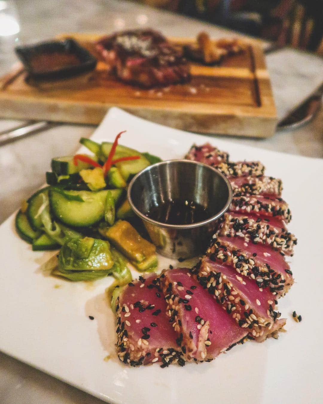Eat With Steph & Coさんのインスタグラム写真 - (Eat With Steph & CoInstagram)「When I’m not eating salmon (my favourite food) I’m eating tuna 🐟Pan-Asian cuisine by @stmartinslanesocial, with these beauuutiful dishes, and my favourite dish was this seared tuna! SO tender and soooo good. And the steak was also a defo winner.  The Hokkien Mee wasn’t super authentic but still packed with flavour and huge ass prawns 😏 (can you tell I’m a #seafoodlover yet) 📷 @verna.banana #invite #panasian #thai #japanese #chinese #steak #tuna #noodles #prawns #feast #treatyoself #yum #londonfood」4月19日 3時19分 - eatwithsteph_ldn