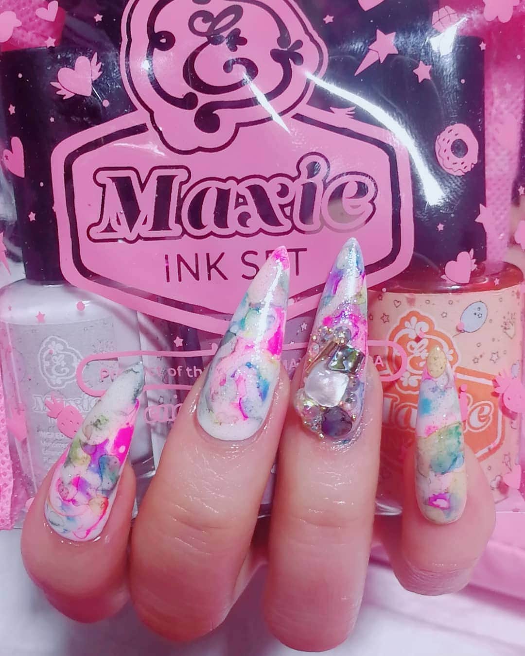 Max Estradaさんのインスタグラム写真 - (Max EstradaInstagram)「Enailcouture.com MAXIE INK SET volume 1 and 2 are HERE !  MAGICALY MAKE BEAUTIFUL WATERCOLOR, TIE-DYE & MARBLING EFFECTS AND MORE WITH EASE! OUR AMERICAN MADE COSMETIC QUALITY APPROVED NAIL INKS! . MAXIE INK SET WORKS ONLY WITH VELVET MATTE GEL AS A SURFACE . PLEASE APPLY A LAYER OF VELVET MATTE TOPCOAT OVER COLOR GEL BEFORE APPLYING MAXIE INK. SEAL WITH A COAT OF SHINEE OR WONDER-GEL FOR A BEAUTIFUL, DIAMOND LIKE FINISH! MAXIE INK SET CONTAINS 6 COLORS AND COMES IN A CUTE CARRY POUCH !  COLORS ARE Beige, white, sky blue, crimson red, lavender, pastel gree kingofnail http://Enailcouture.com acrylic system in crystal clear powder with disco pure glitter mix and cotton candy monomer and diamond holic 23, gummy gel and wonder gel top coat ! New nail art diamonds are here ! Diamond carousel in 3 types to choose from ! Only $3.99 in the USA ! Apply with shinee and gummy gel for a dazzling finish! Here we used eternal beige powder and cotton candy monomer #ネイル #nailpolish #nailswag#nailaddict#nailfashion #nailartheaven#nails2inspire#nailsofinstagram #instanails#naillife#nailporn #gelnails #gelpolish#stilettonails#nailaddict #nailcolor#nailsalon #nailproducts #nailsupplies#acrylicnails #nailsdid #nailsoftheday http://Enailcouture.com happy gel is like acrylic and gel had a baby ! Perfect no mess application, candy smell and no airborne dust ! http://Enailcouture.com」4月19日 3時26分 - kingofnail