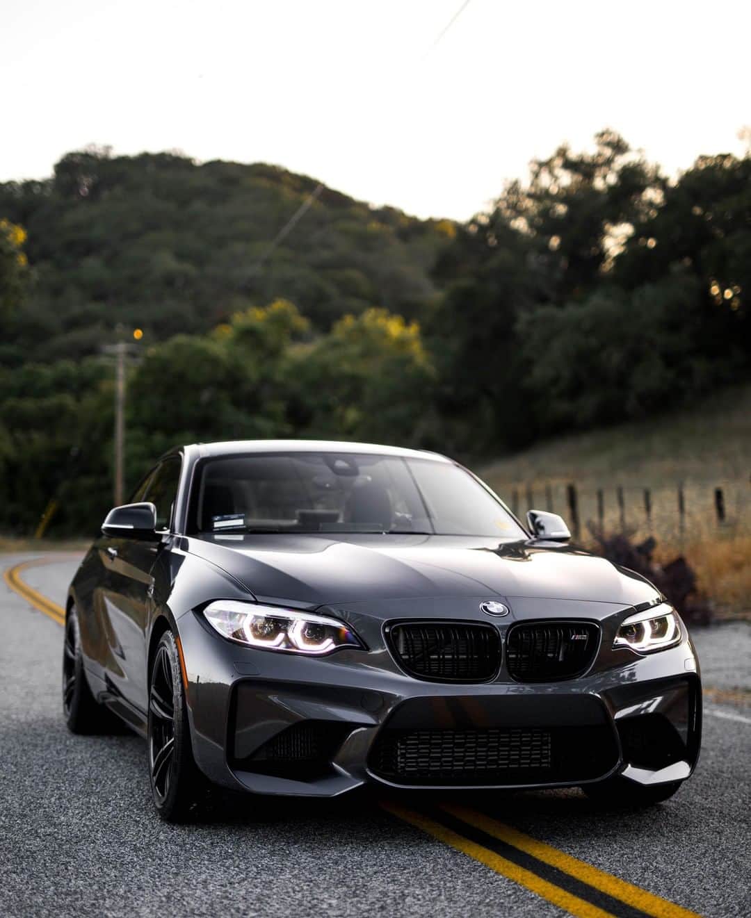 BMWのインスタグラム：「More than a sports car. The BMW M2 Coupé. #BMWrepost @californiaexoticsdaily @whale.f87m  #BMW #M2 #BMWM __ BMW M2 Coupé: Fuel consumption in l/100 km (combined): 8.5. CO2 emissions in g/km (combined): 199. The values of fuel consumptions, CO2 emissions and energy consumptions shown were determined according to the European Regulation (EC) 715/2007 in the version applicable at the time of type approval. The figures refer to a vehicle with basic configuration in Germany and the range shown considers optional equipment and the different size of wheels and tires available on the selected model. The values of the vehicles are already based on the new WLTP regulation and are translated back into NEDC-equivalent values in order to ensure the comparison between the vehicles. [With respect to these vehicles, for vehicle related taxes or other duties based (at least inter alia) on CO2-emissions the CO2 values may differ to the values stated here.] The values of the vehicles are preliminary. The CO2 efficiency specifications are determined according to Directive 1999/94/EC and the European Regulation in its current version applicable. The values shown are based on the fuel consumption, CO2 values and energy consumptions according to the NEDC cycle for the classification. For further information about the official fuel consumption and the specific CO2 emission of new passenger cars can be taken out of the „handbook of fuel consumption, the CO2 emission and power consumption of new passenger cars“, which is available at all selling points and at https://www.dat.de/angebote/verlagsprodukte/leitfaden-kraftstoffverbrauch.html.」